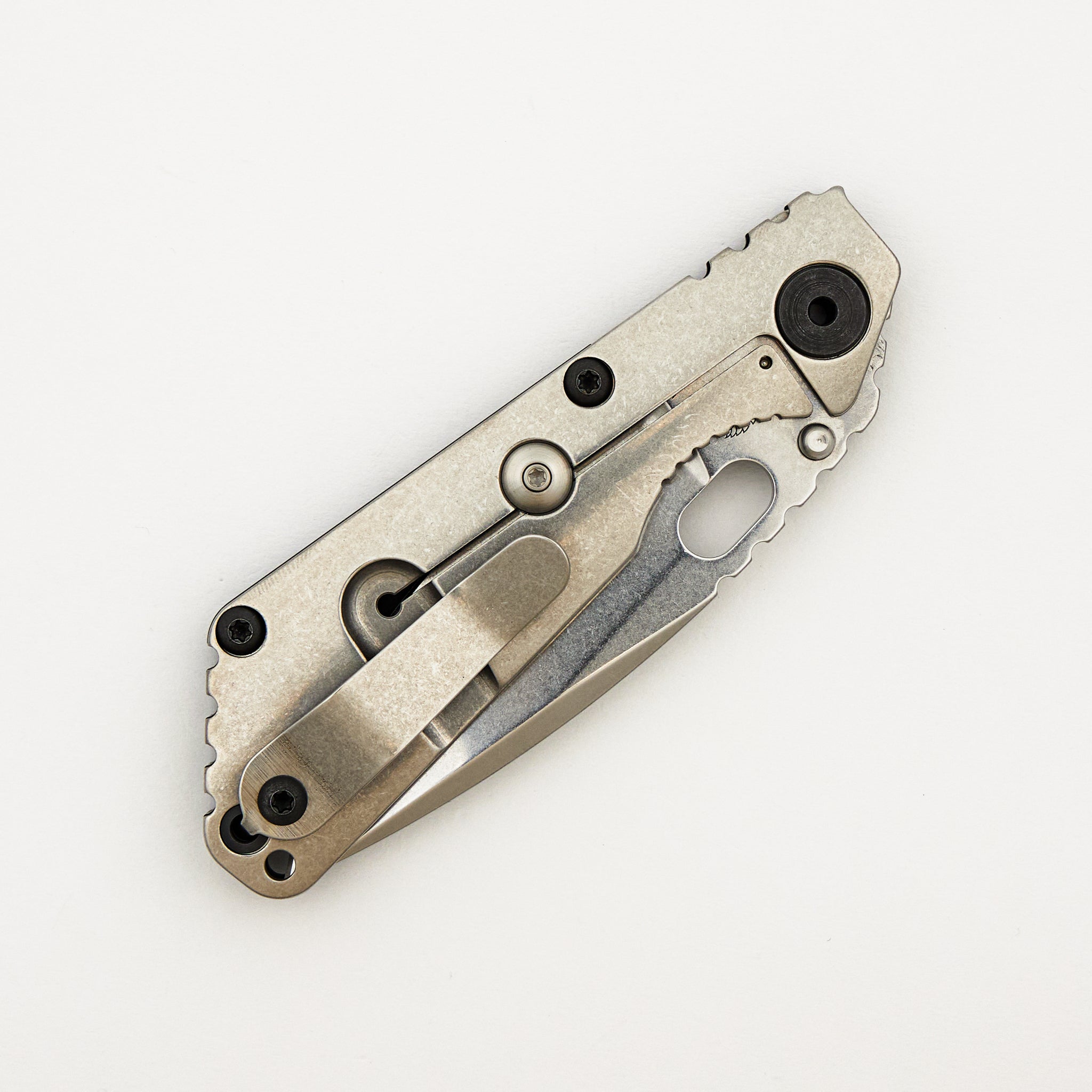 SNG CC - Titanium/Black G10 Handle - Drop Point MagnaCut Blade