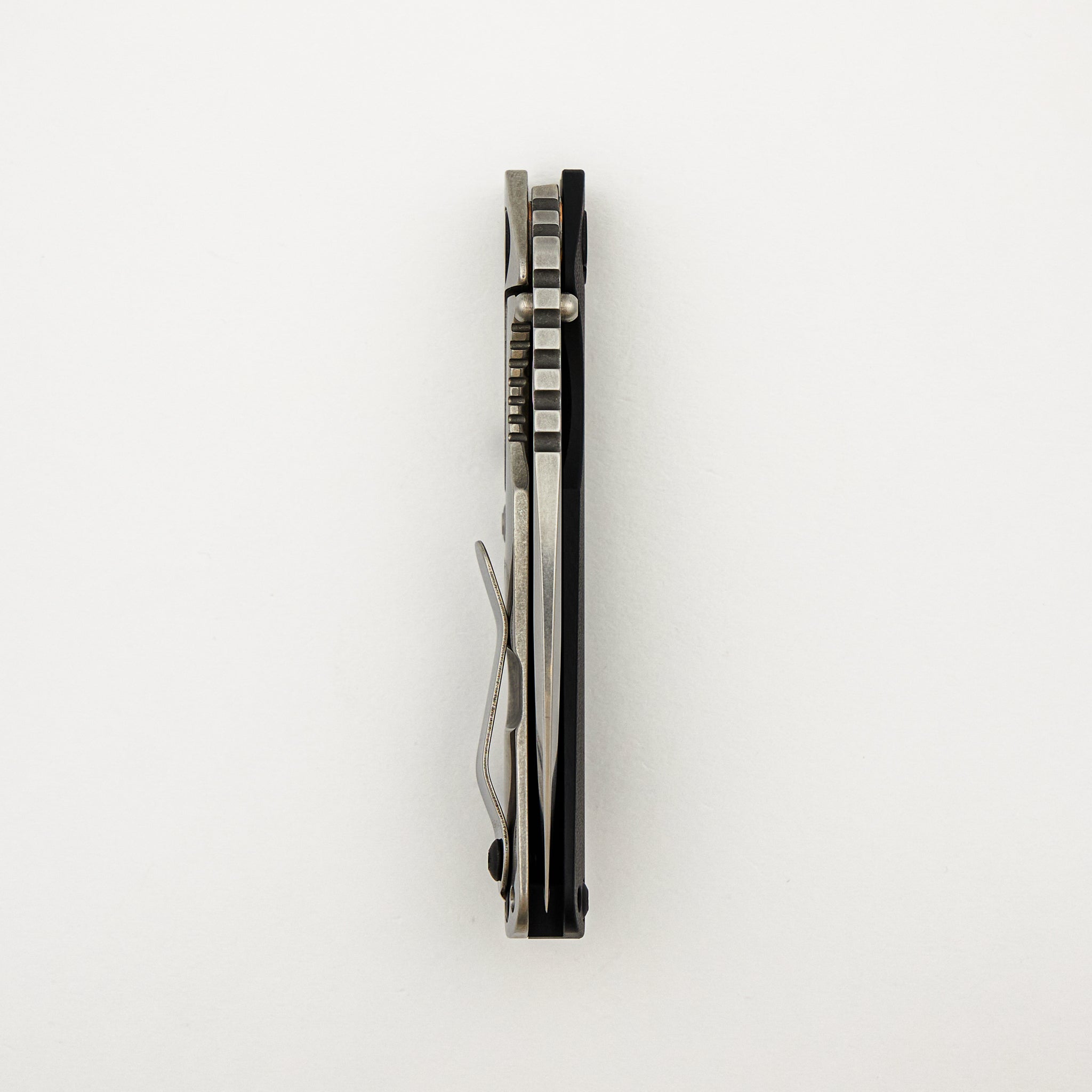 SNG CC - Titanium/Black G10 Handle - Drop Point MagnaCut Blade