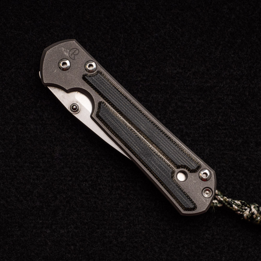 CHRIS REEVE SMALL SEBENZA 21 BLACK CANVAS MICARTA INLAY - S35VN BLADE - SILVER DOUBLE THUMB LUGS