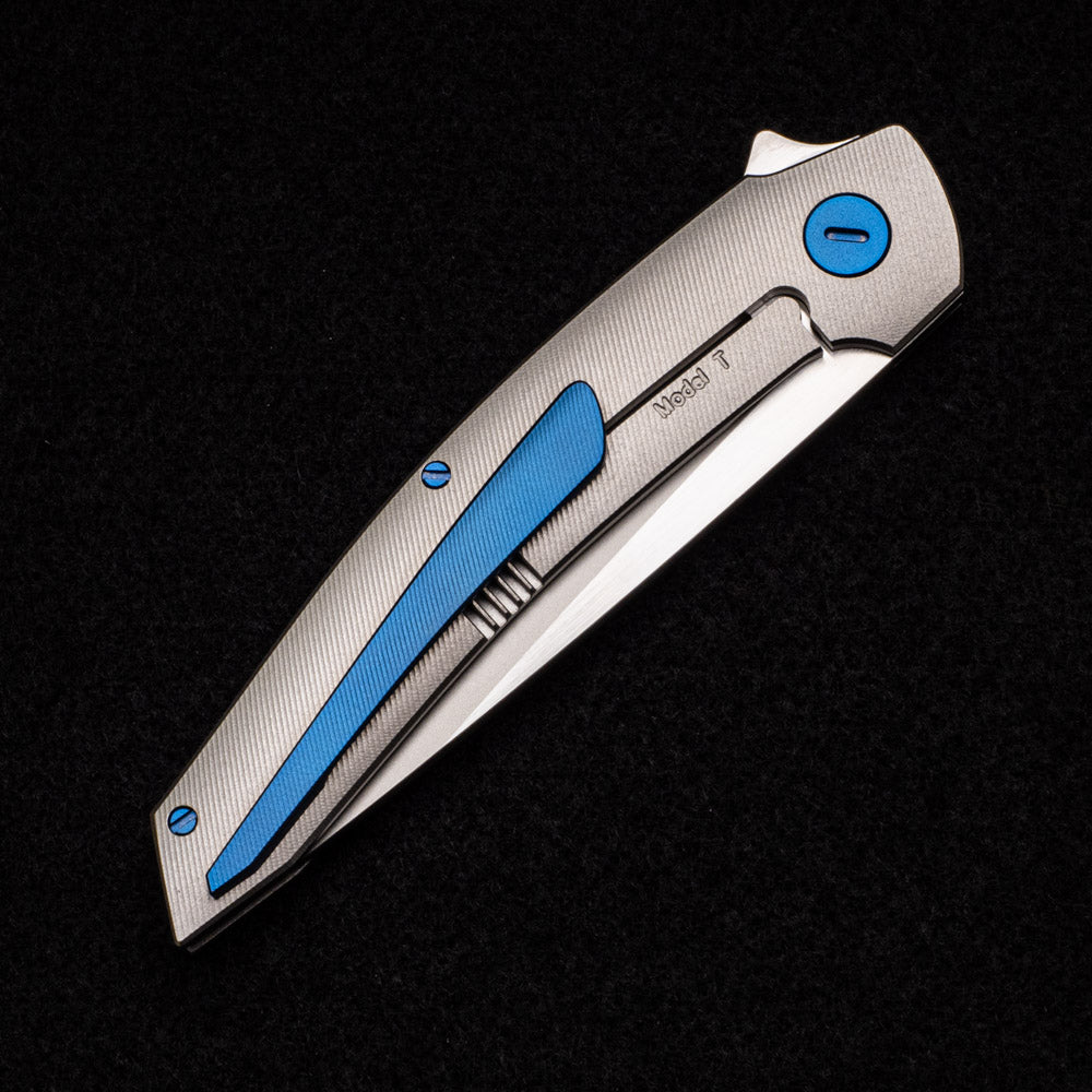 Hog House Knives Model T – RWL-34 Blade W- Satin Flats – Ti W- Dark Blue