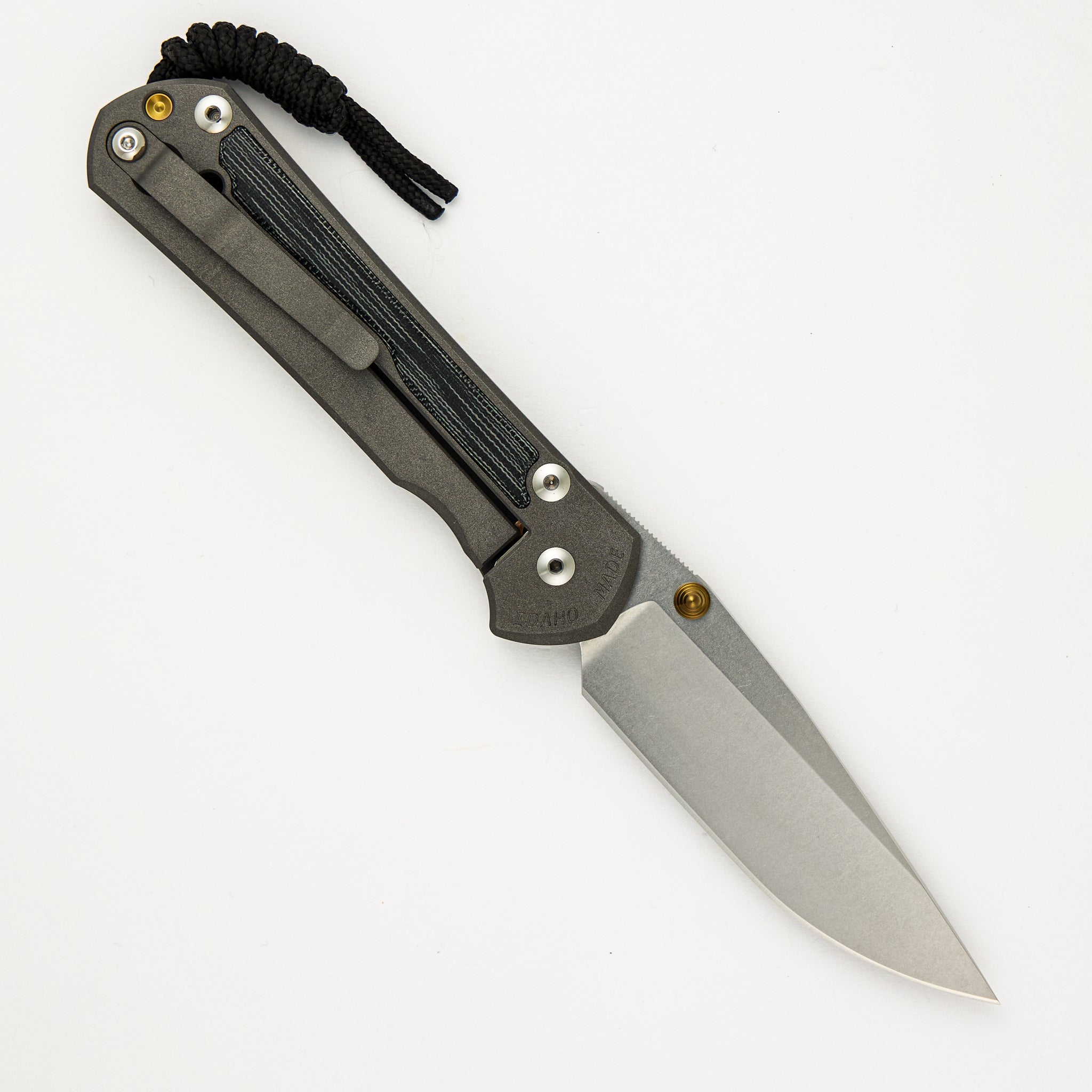 Chris Reeve Large Sebenza 31 - Drop Point CPM MagnaCut Blade - Black Canvas Micarta Inlays - Gold Double Thumb Lugs