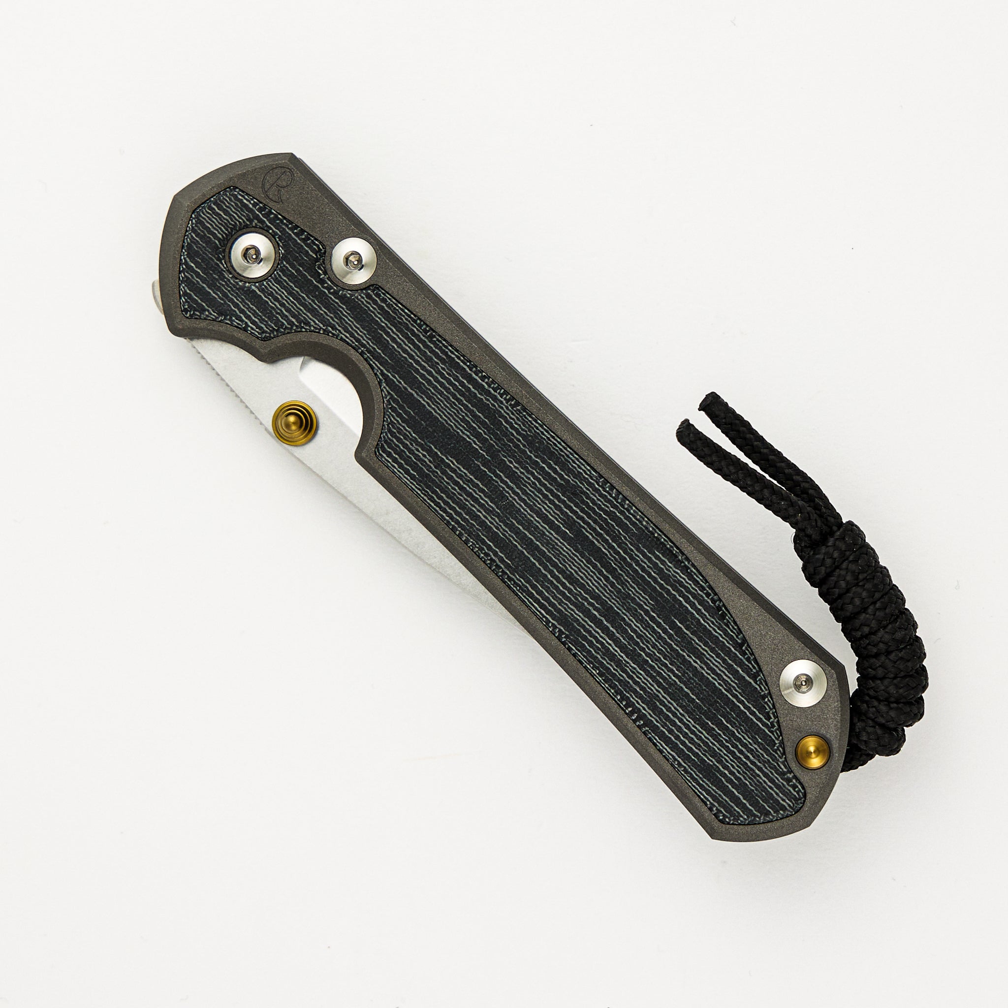 Chris Reeve Large Sebenza 31 - Drop Point CPM MagnaCut Blade - Black Canvas Micarta Inlays - Gold Double Thumb Lugs