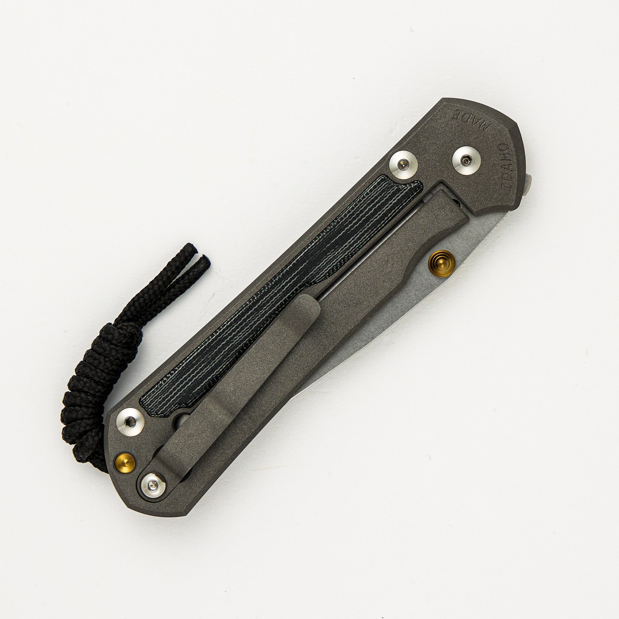 Chris Reeve Large Sebenza 31 - Drop Point CPM MagnaCut Blade - Black Canvas Micarta Inlays - Gold Double Thumb Lugs