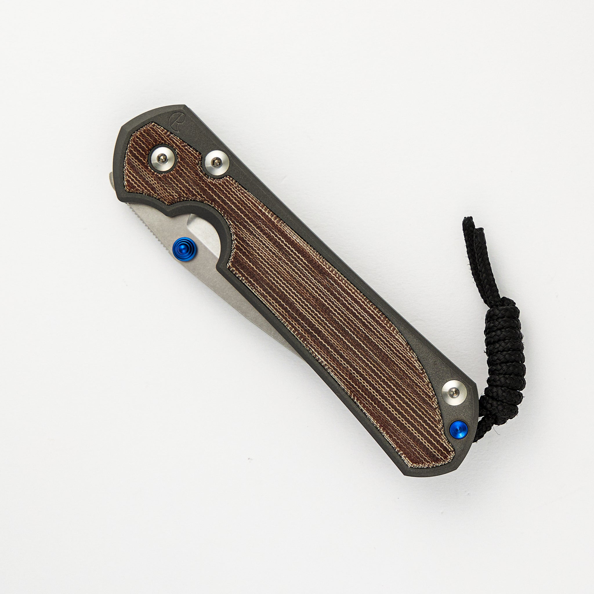 CHRIS REEVE LARGE SEBENZA 31 NATURAL CANVAS MICARTA INLAY – CPM MAGNACUT BLADE – BLUE DOUBLE THUMB LUGS