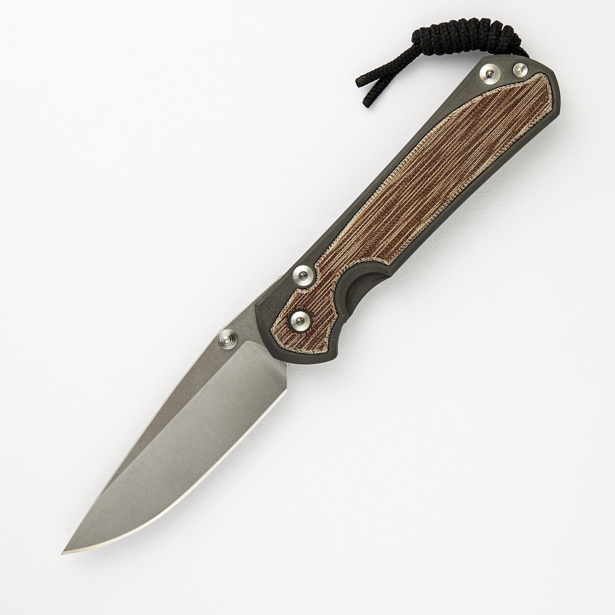 CHRIS REEVE LARGE SEBENZA 31 NATURAL CANVAS MICARTA INLAY – CPM MAGNACUT BLADE – SILVER DOUBLE THUMB LUGS