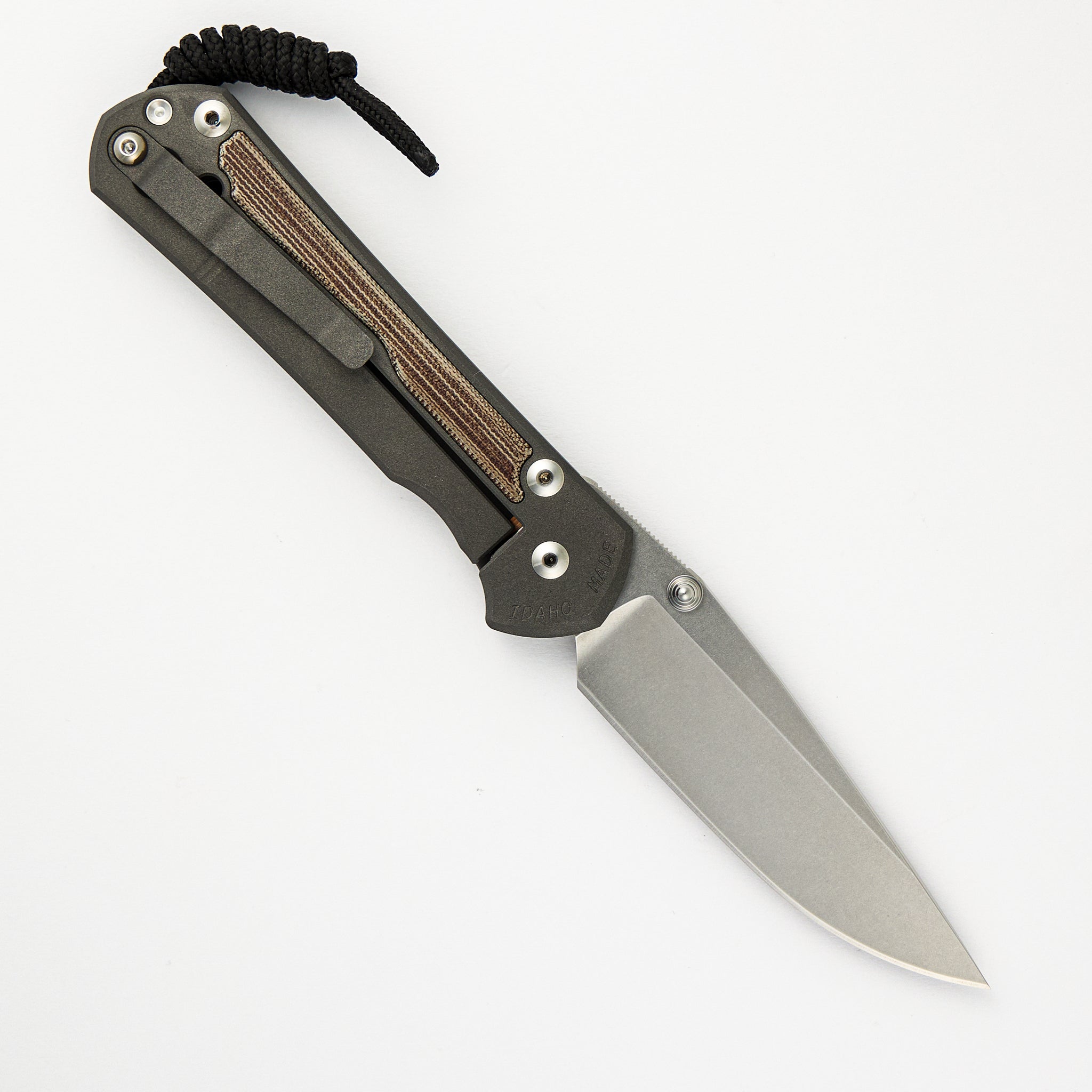 CHRIS REEVE LARGE SEBENZA 31 NATURAL CANVAS MICARTA INLAY – CPM MAGNACUT BLADE – SILVER DOUBLE THUMB LUGS