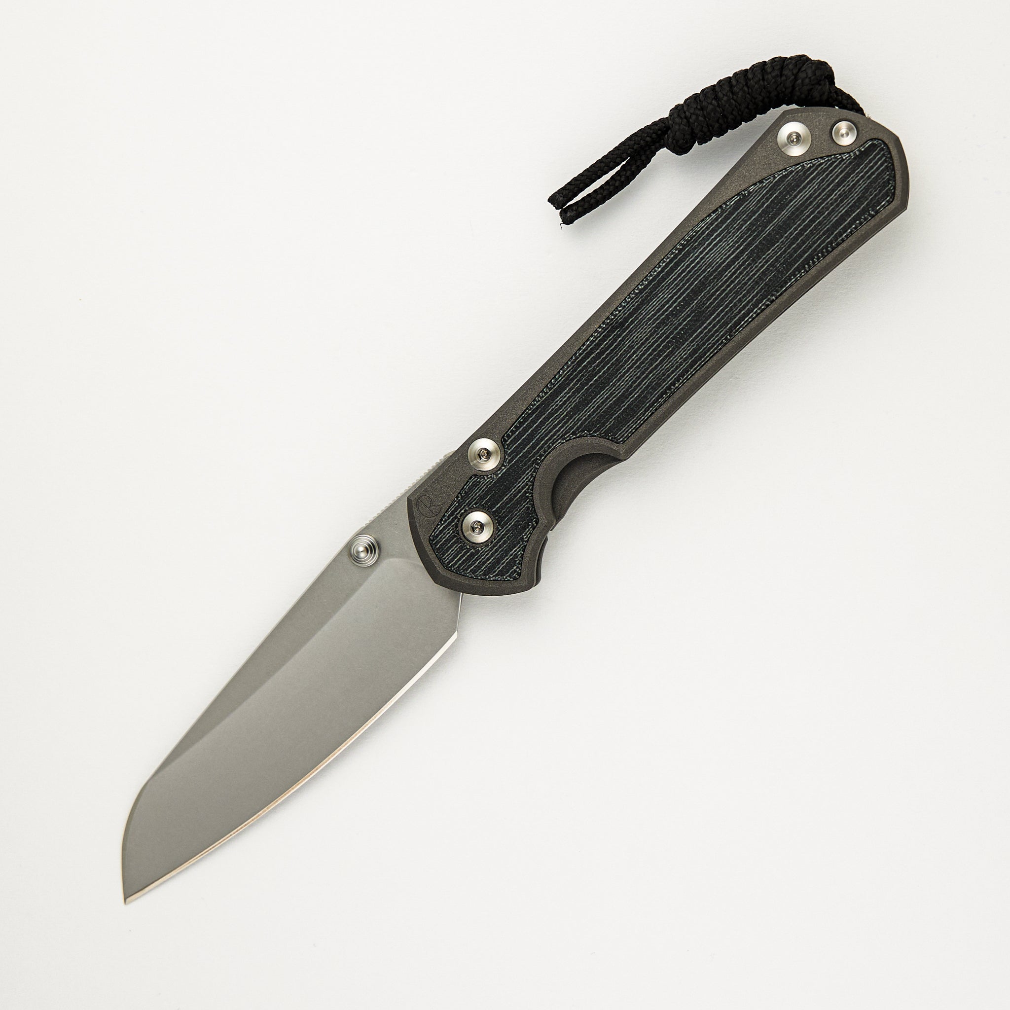 Chris Reeve Large Sebenza 31 Black Canvas Micarta Inlay - Insingo CPM MagnaCut Blade - Silver Double Thumb Lugs