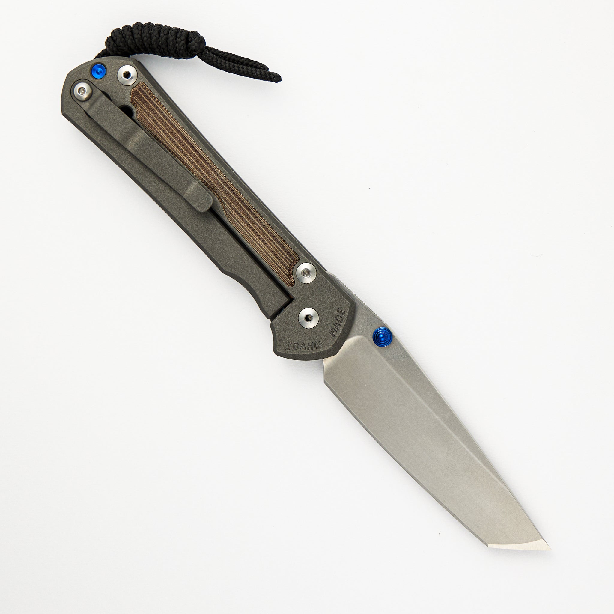 CHRIS REEVE LARGE SEBENZA 31 NATURAL CANVAS MICARTA INLAY – TANTO CPM MAGNACUT BLADE – BLUE DOUBLE THUMB LUGS