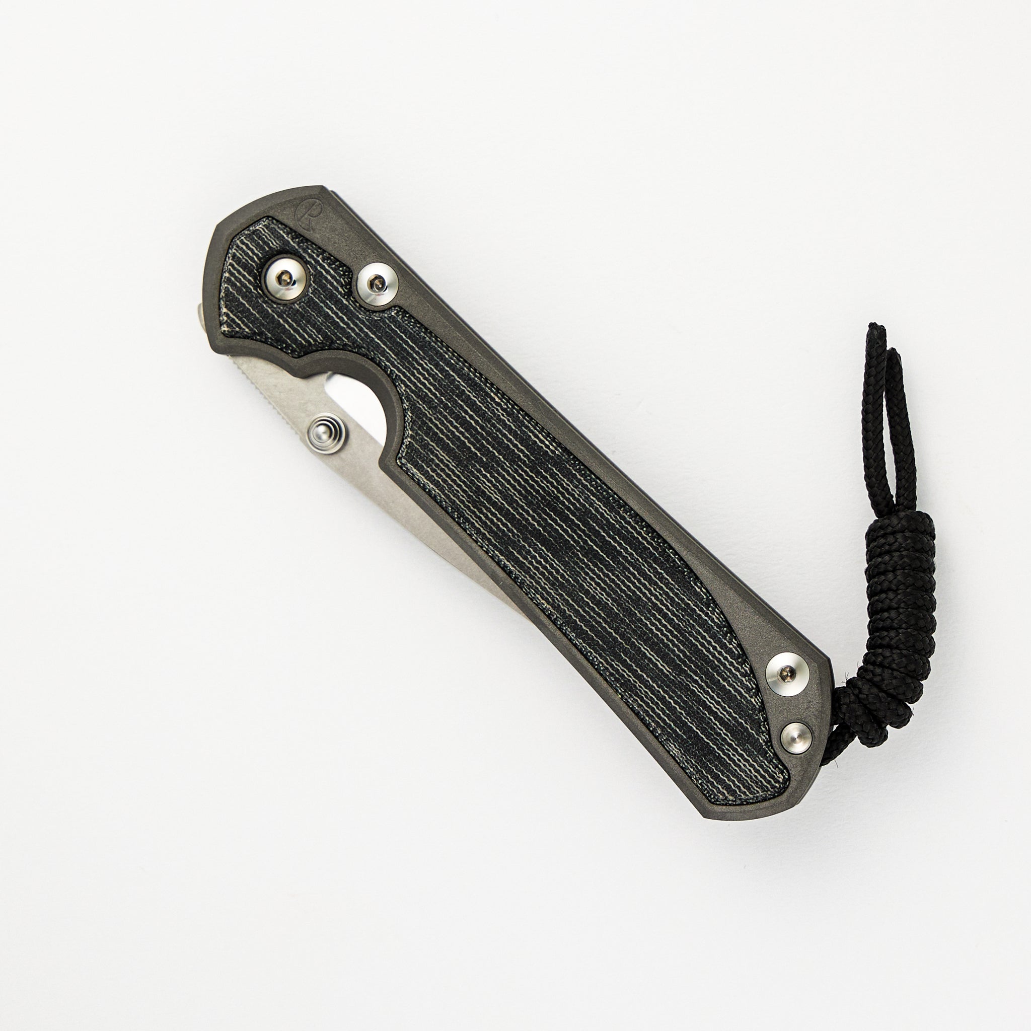 CHRIS REEVE LARGE SEBENZA 31 BLACK CANVAS MICARTA INLAY – POLISHED CPM MAGNACUT BLADE – SILVER DOUBLE THUMB LUGS