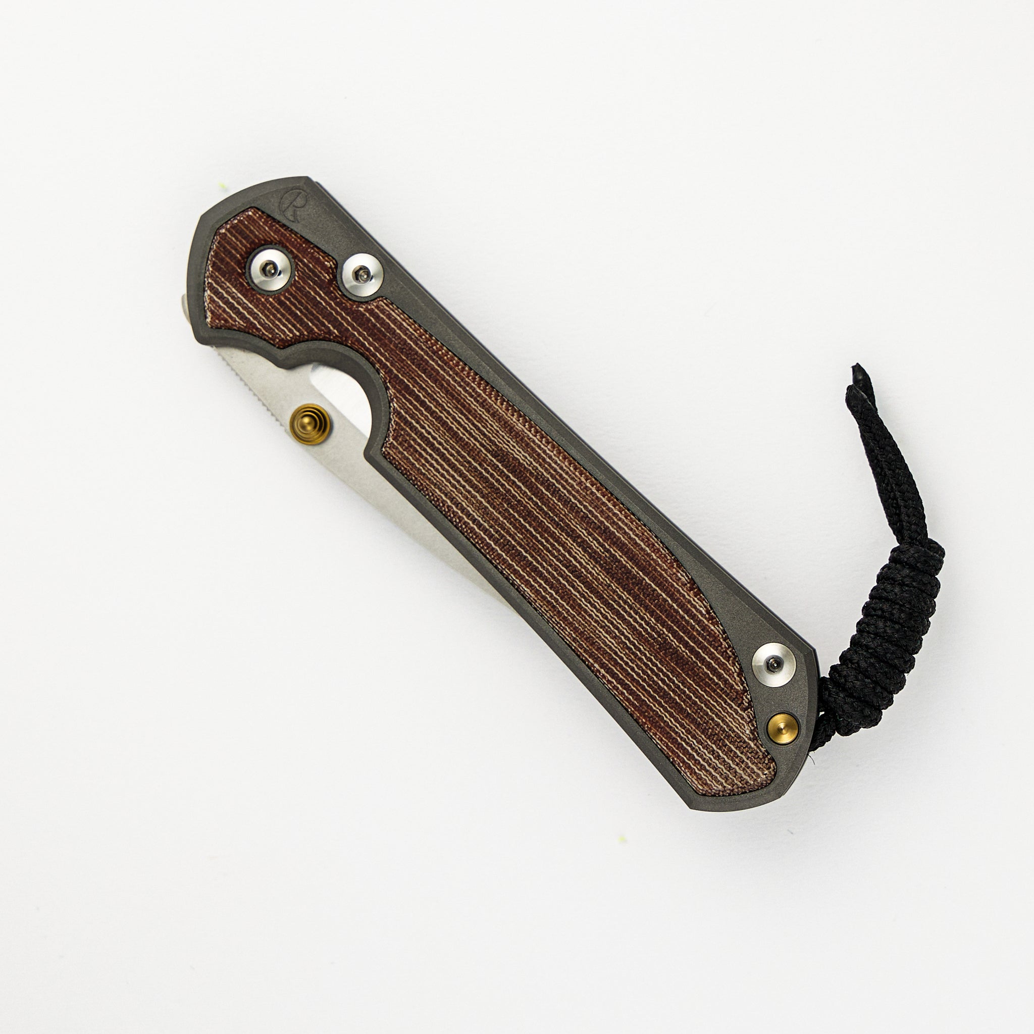 CHRIS REEVE LARGE SEBENZA 31 NATURAL CANVAS MICARTA INLAY – POLISHED CPM MAGNACUT BLADE – GOLD DOUBLE THUMB LUGS