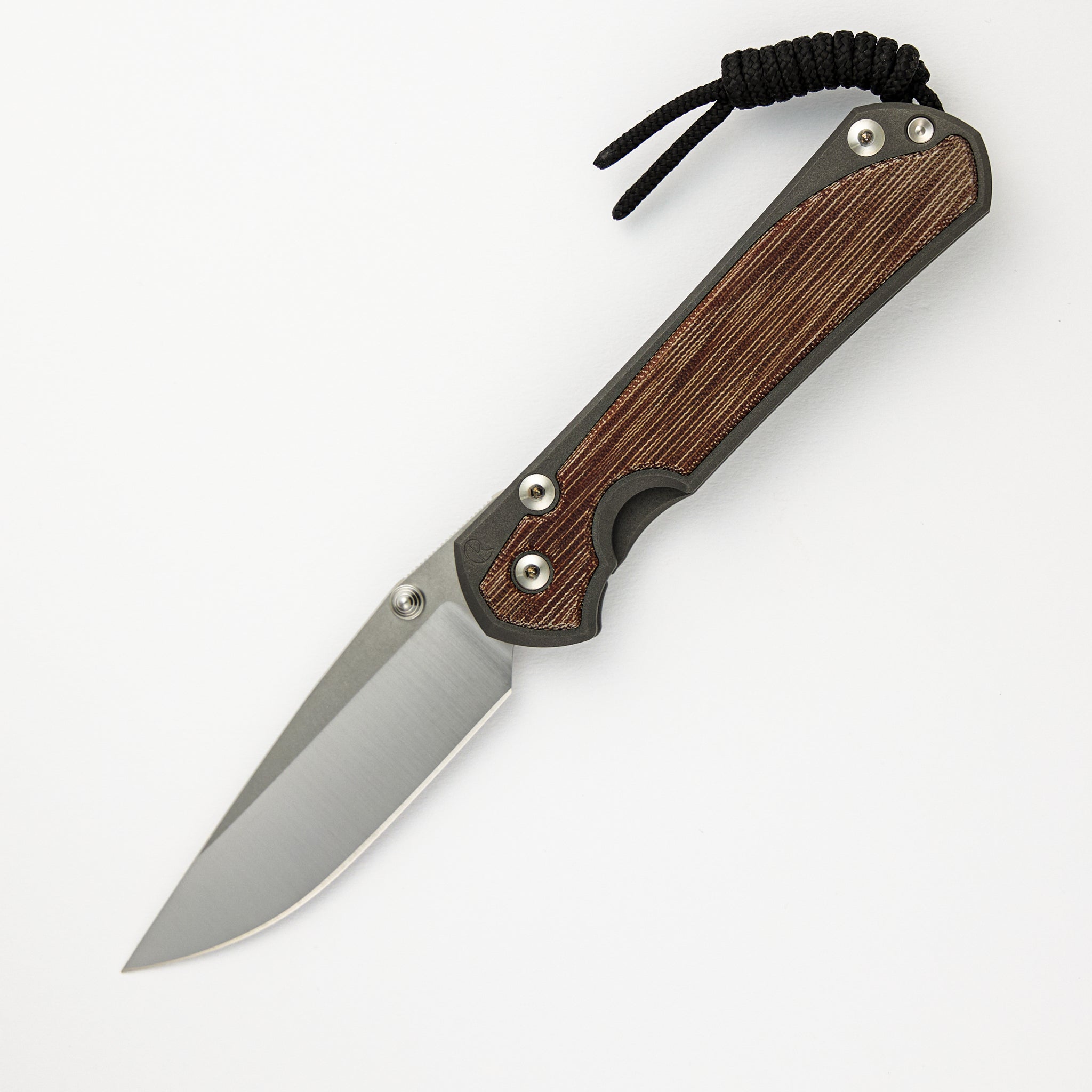 CHRIS REEVE LARGE SEBENZA 31 NATURAL CANVAS MICARTA INLAY – POLISHED CPM MAGNACUT BLADE – SILVER DOUBLE THUMB LUGS