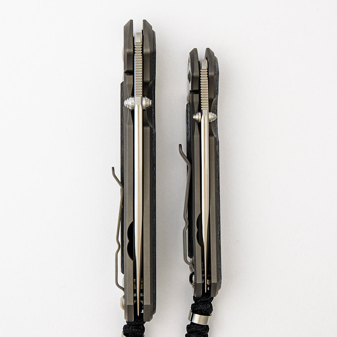 Large & Small Sebenza 31 Numbered Matched Set # 83 - White CarboTi Inlay - Polished Drop Point CPM MagnaCut Blade - Silver Double Lugs