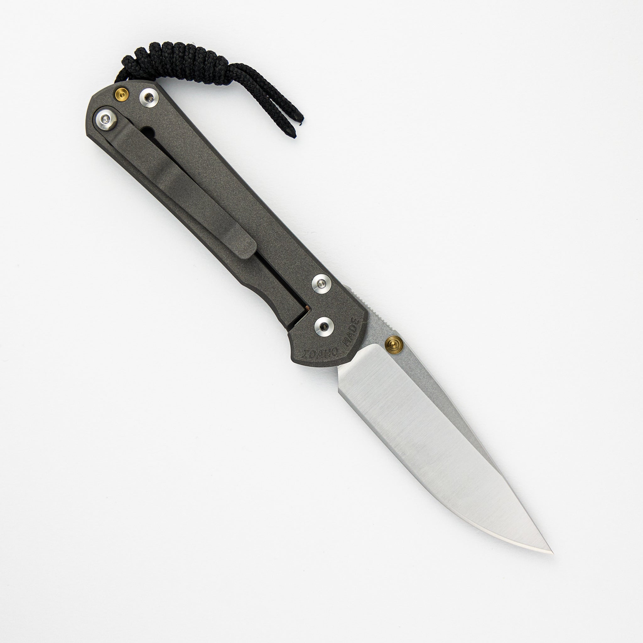 CHRIS REEVE SMALL SEBENZA 31 – POLISHED CPM MAGNACUT BLADE – GOLD DOUBLE THUMB LUGS