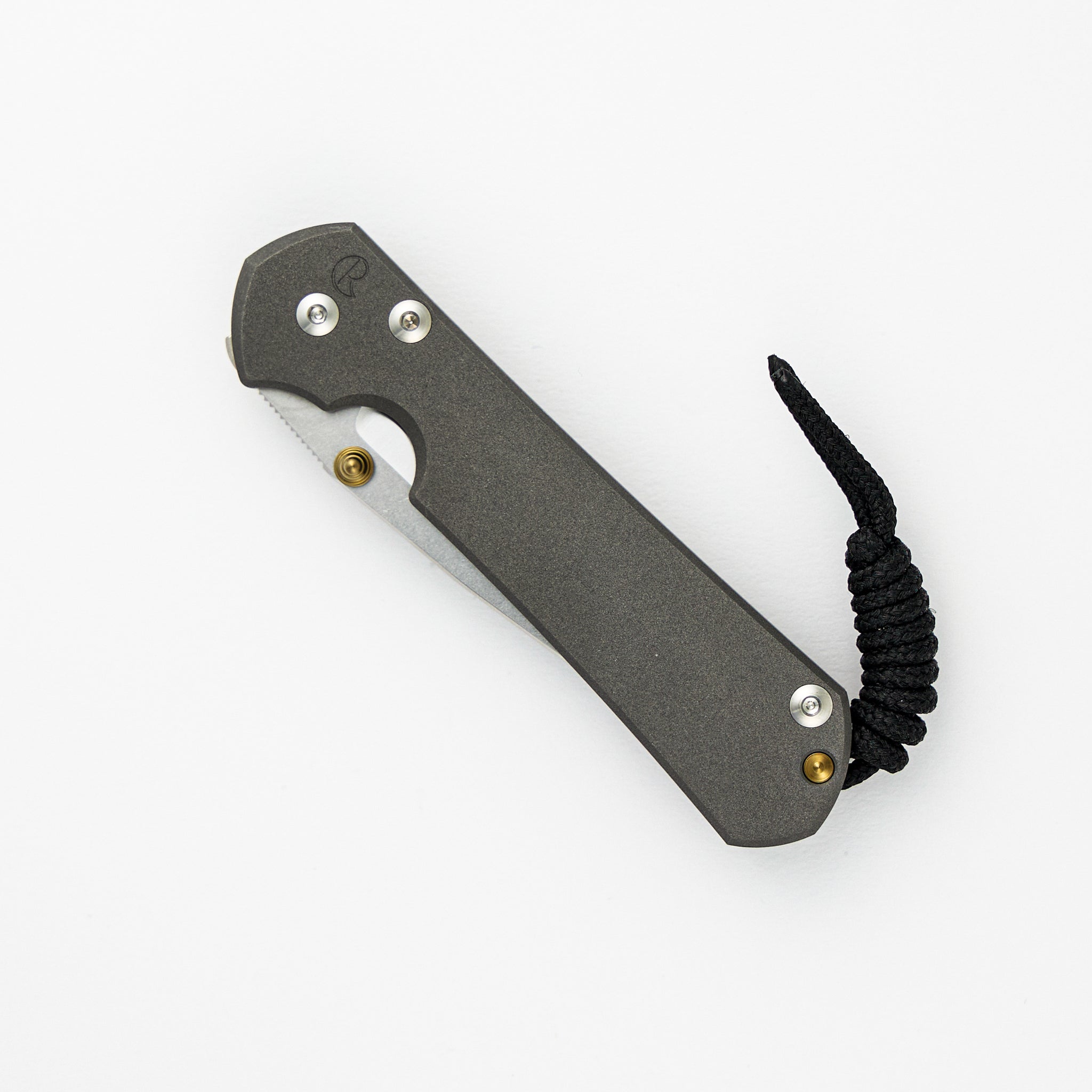 CHRIS REEVE SMALL SEBENZA 31 – POLISHED CPM MAGNACUT BLADE – GOLD DOUBLE THUMB LUGS