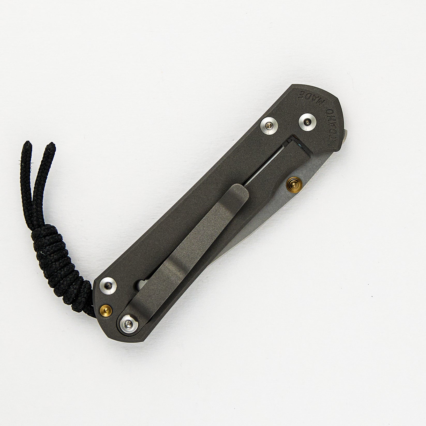 CHRIS REEVE SMALL SEBENZA 31 – POLISHED CPM MAGNACUT BLADE – GOLD DOUBLE THUMB LUGS