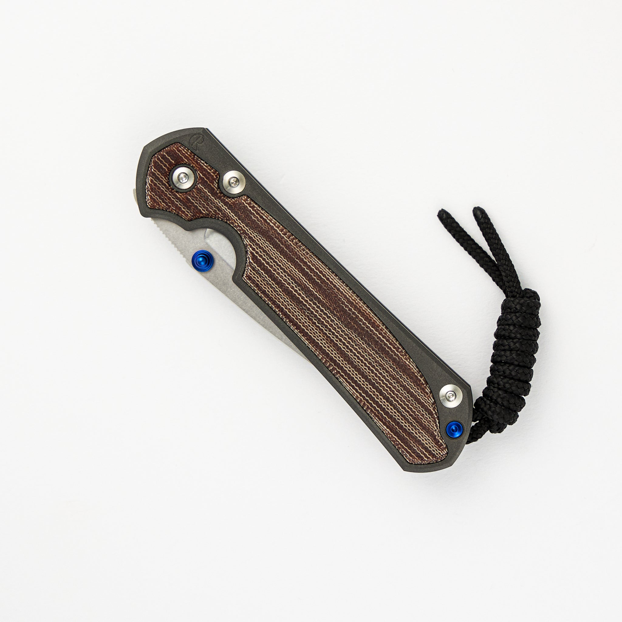 CHRIS REEVE SMALL SEBENZA 31 NATURAL CANVAS MICARTA INLAY – CPM MAGNACUT BLADE – BLUE DOUBLE THUMB LUGS