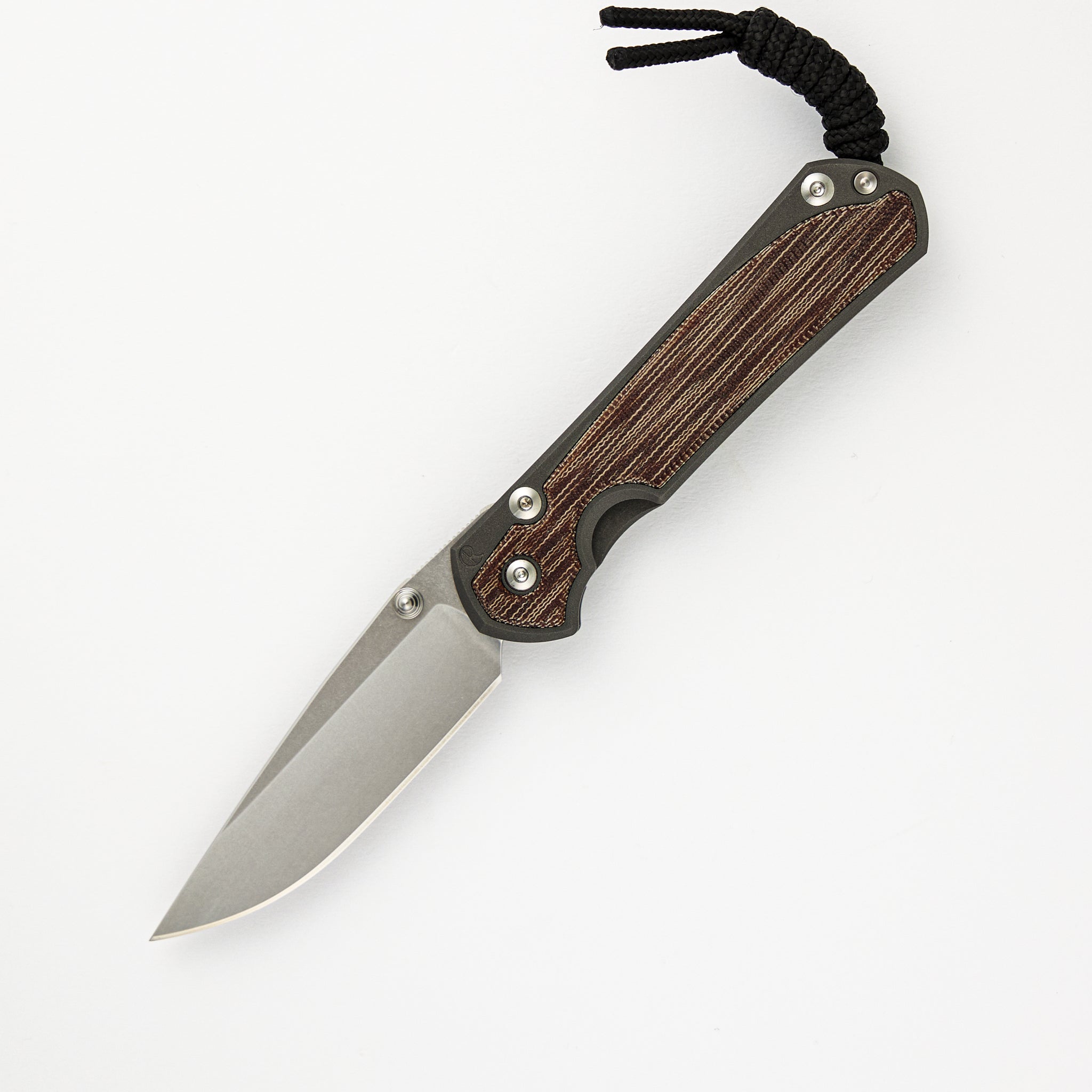 CHRIS REEVE SMALL SEBENZA 31 NATURAL CANVAS MICARTA INLAY – CPM MAGNACUT BLADE – SILVER DOUBLE THUMB LUGS