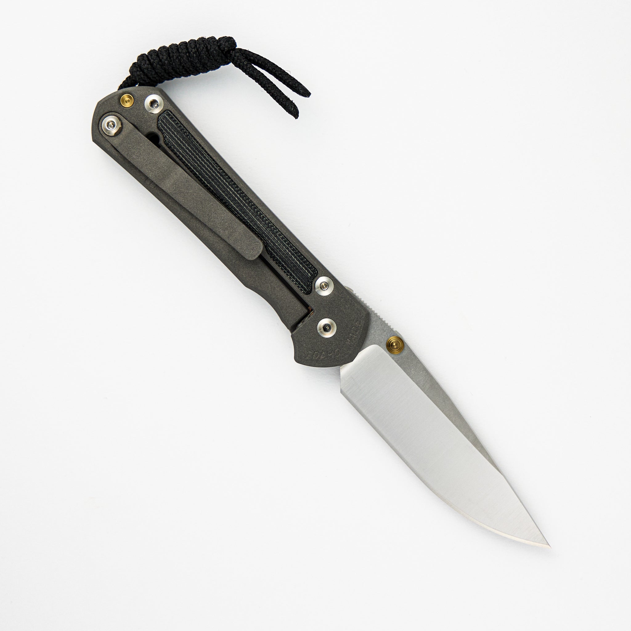 CHRIS REEVE SMALL SEBENZA 31 BLACK CANVAS MICARTA INLAY – POLISHED CPM MAGNACUT BLADE – GOLD DOUBLE THUMB LUGS