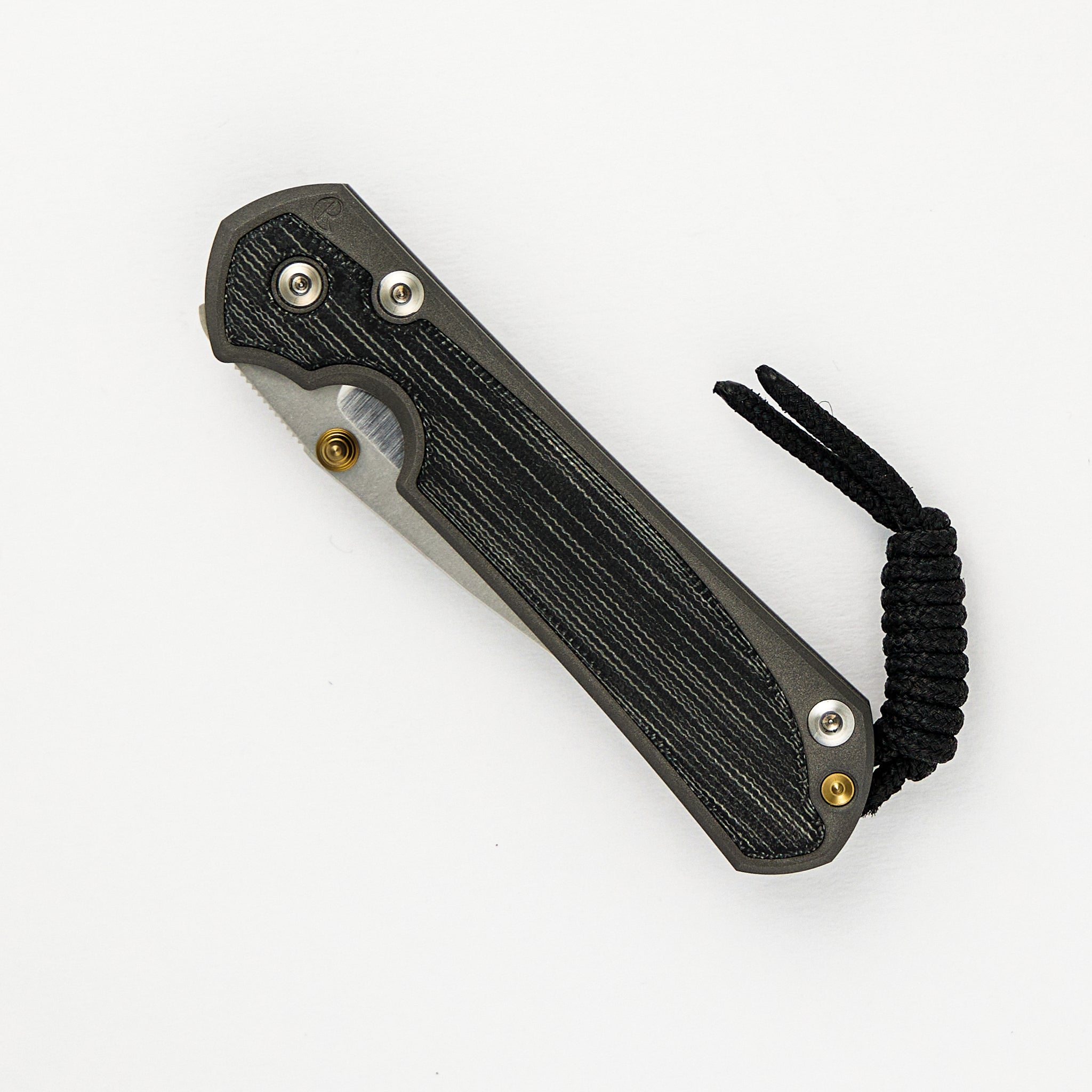 CHRIS REEVE SMALL SEBENZA 31 BLACK CANVAS MICARTA INLAY – POLISHED CPM MAGNACUT BLADE – GOLD DOUBLE THUMB LUGS