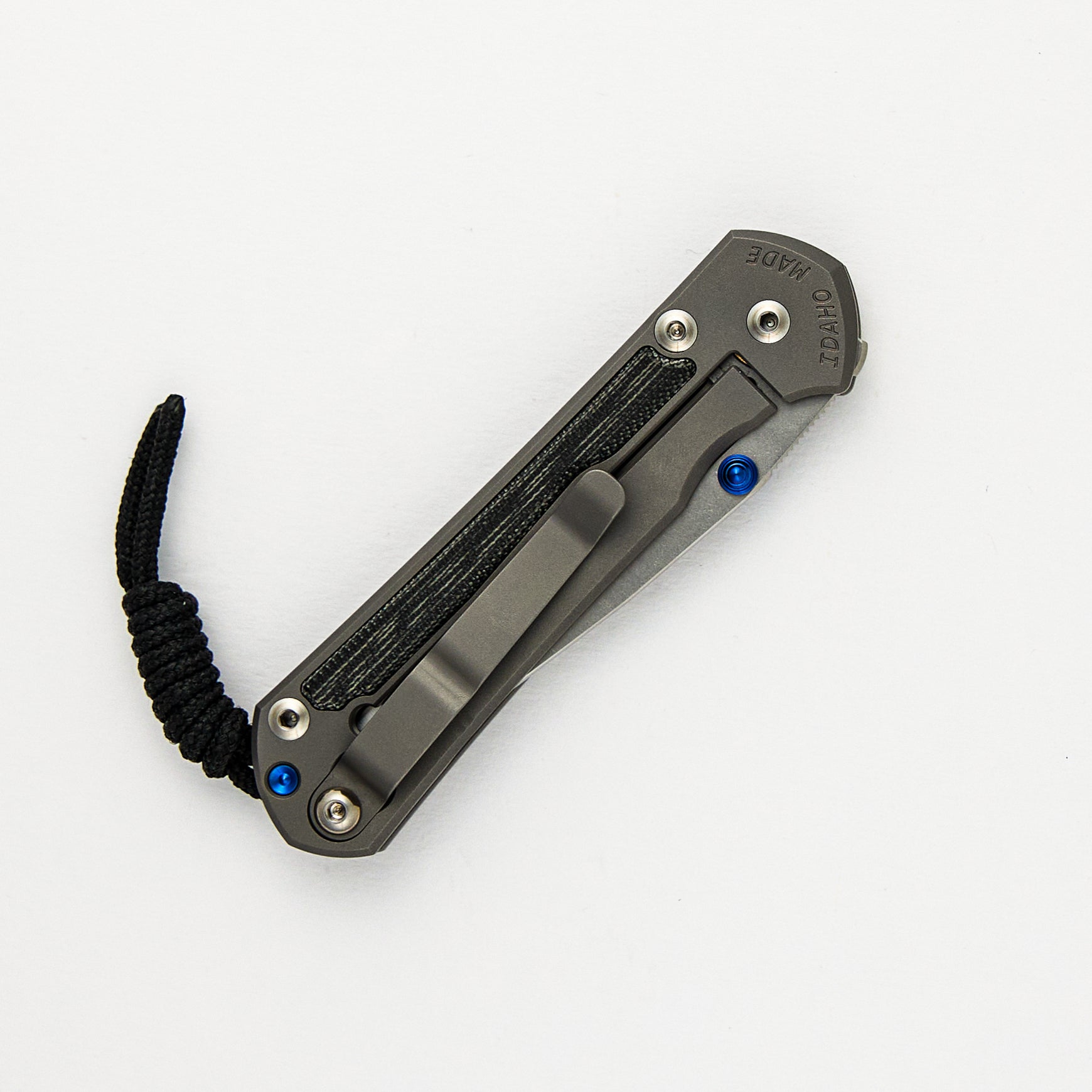 CHRIS REEVE SMALL SEBENZA 31 BLACK CANVAS MICARTA INLAY – POLISHED CPM MAGNACUT BLADE – GLASS BLASTED – BLUE DOUBLE THUMB LUGS