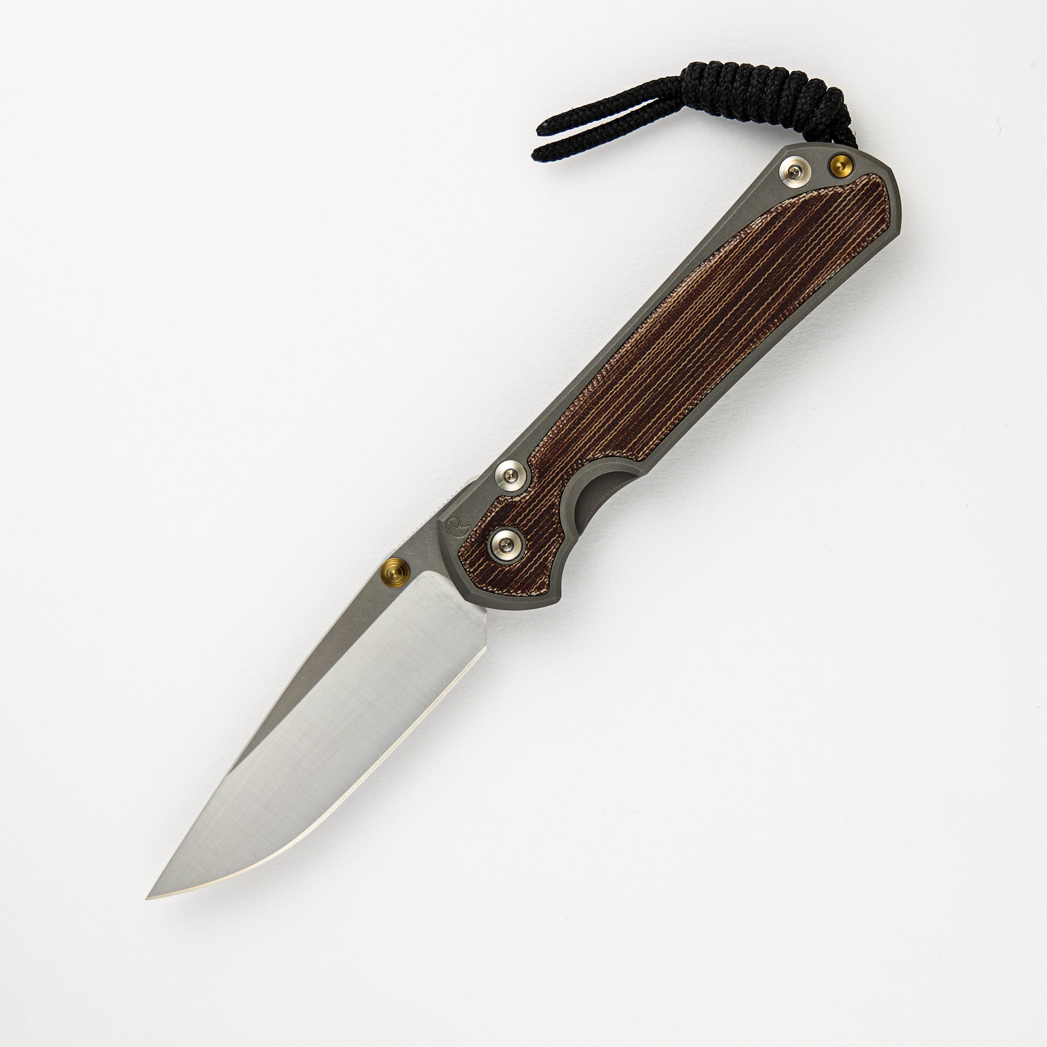 CHRIS REEVE SMALL SEBENZA 31 NATURAL CANVAS MICARTA INLAY – POLISHED CPM MAGNACUT BLADE – GLASS BLASTED – GOLD DOUBLE THUMB LUGS