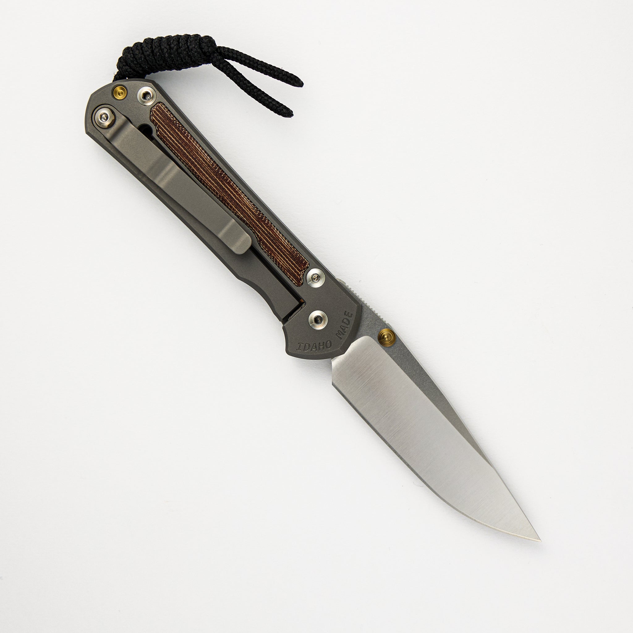 CHRIS REEVE SMALL SEBENZA 31 NATURAL CANVAS MICARTA INLAY – POLISHED CPM MAGNACUT BLADE – GLASS BLASTED – GOLD DOUBLE THUMB LUGS
