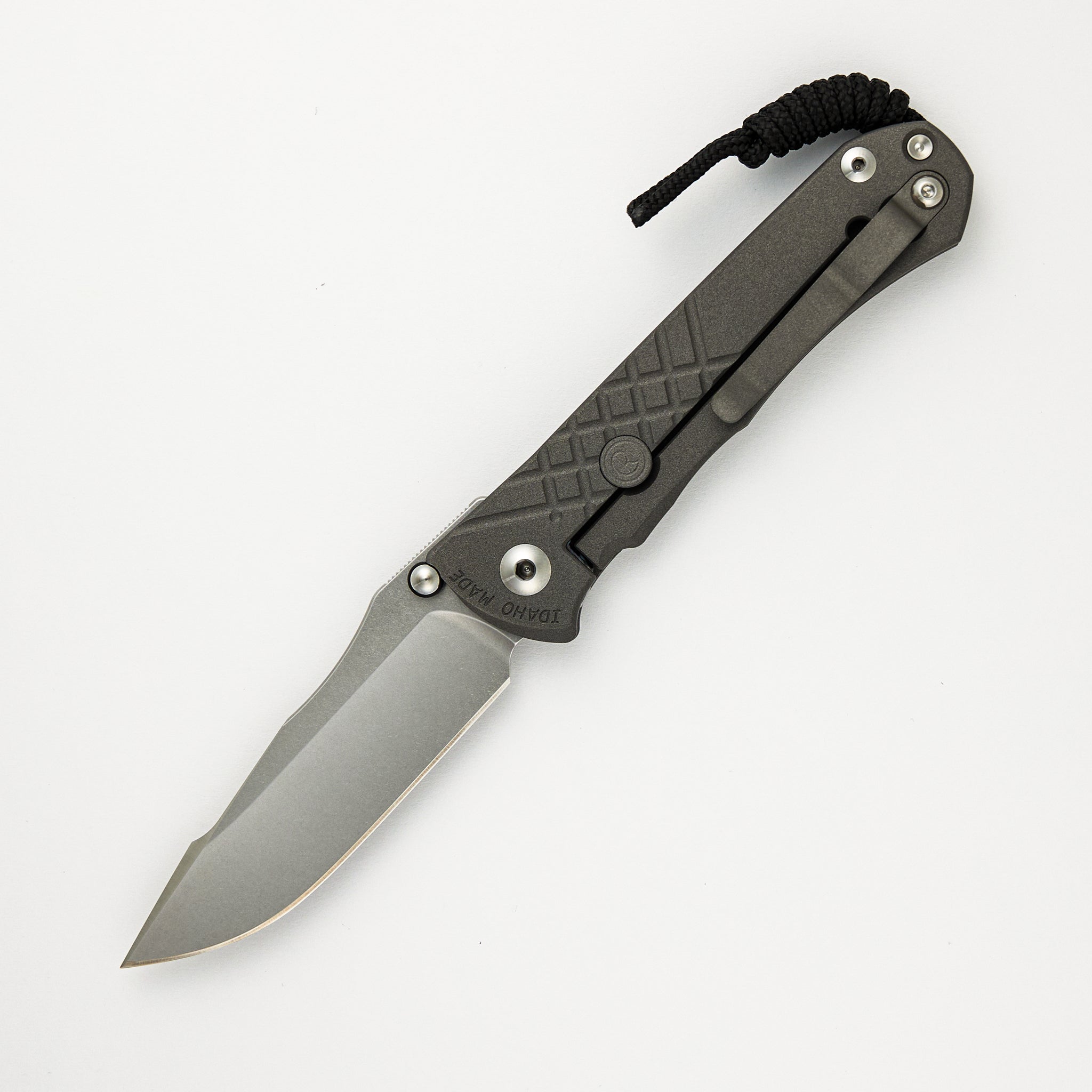 Chris Reeve Umnumzaan Lefty - Drop Point MagnaCut Blade - Titanium Handle