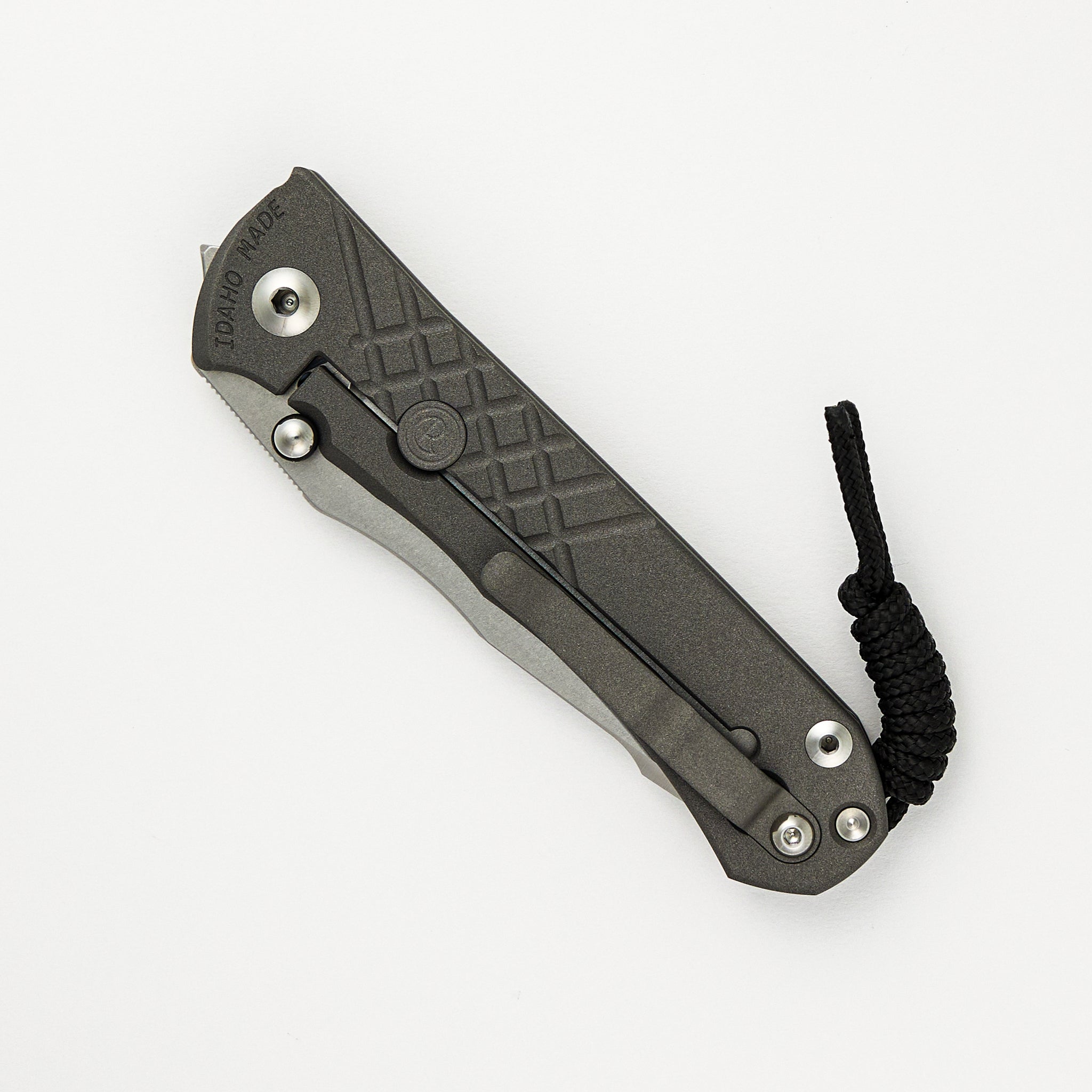 Chris Reeve Umnumzaan Lefty - Drop Point MagnaCut Blade - Titanium Handle