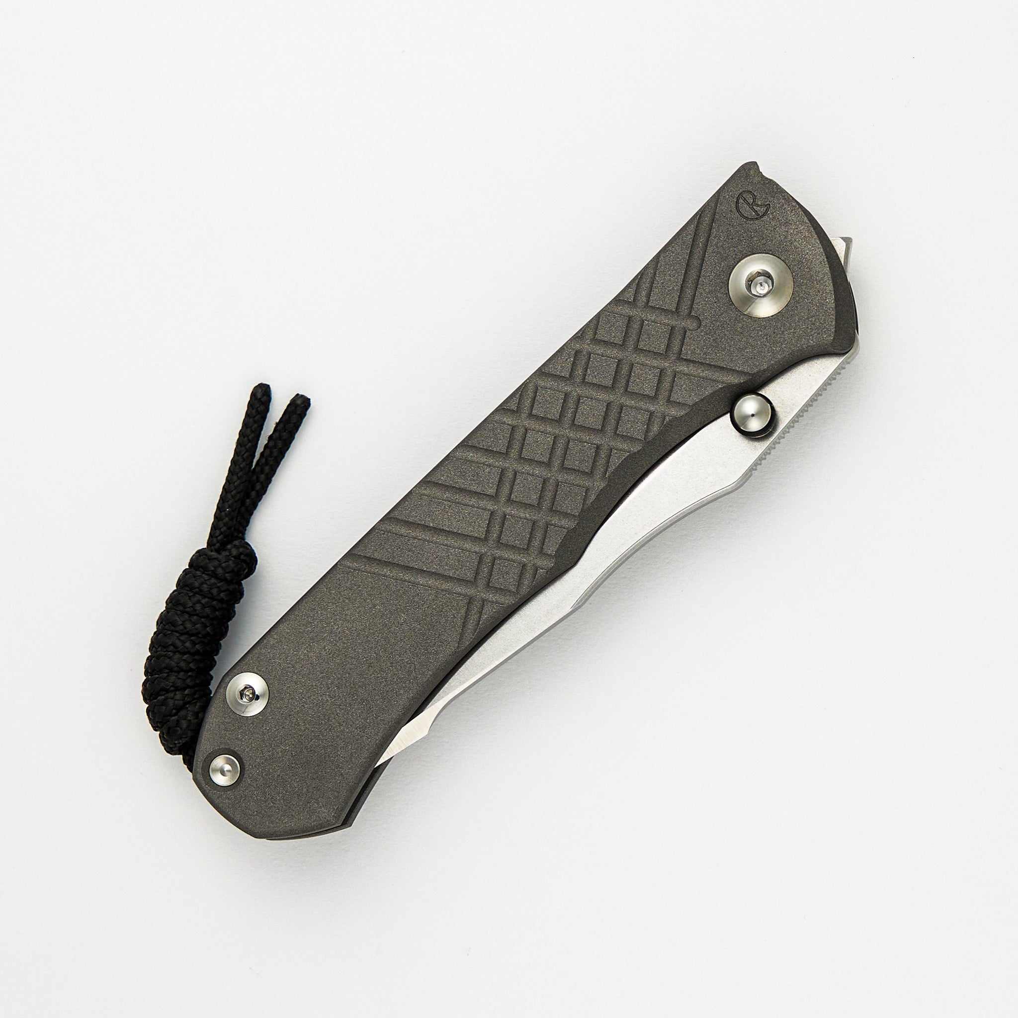 Chris Reeve Umnumzaan Lefty - Drop Point MagnaCut Blade - Titanium Handle