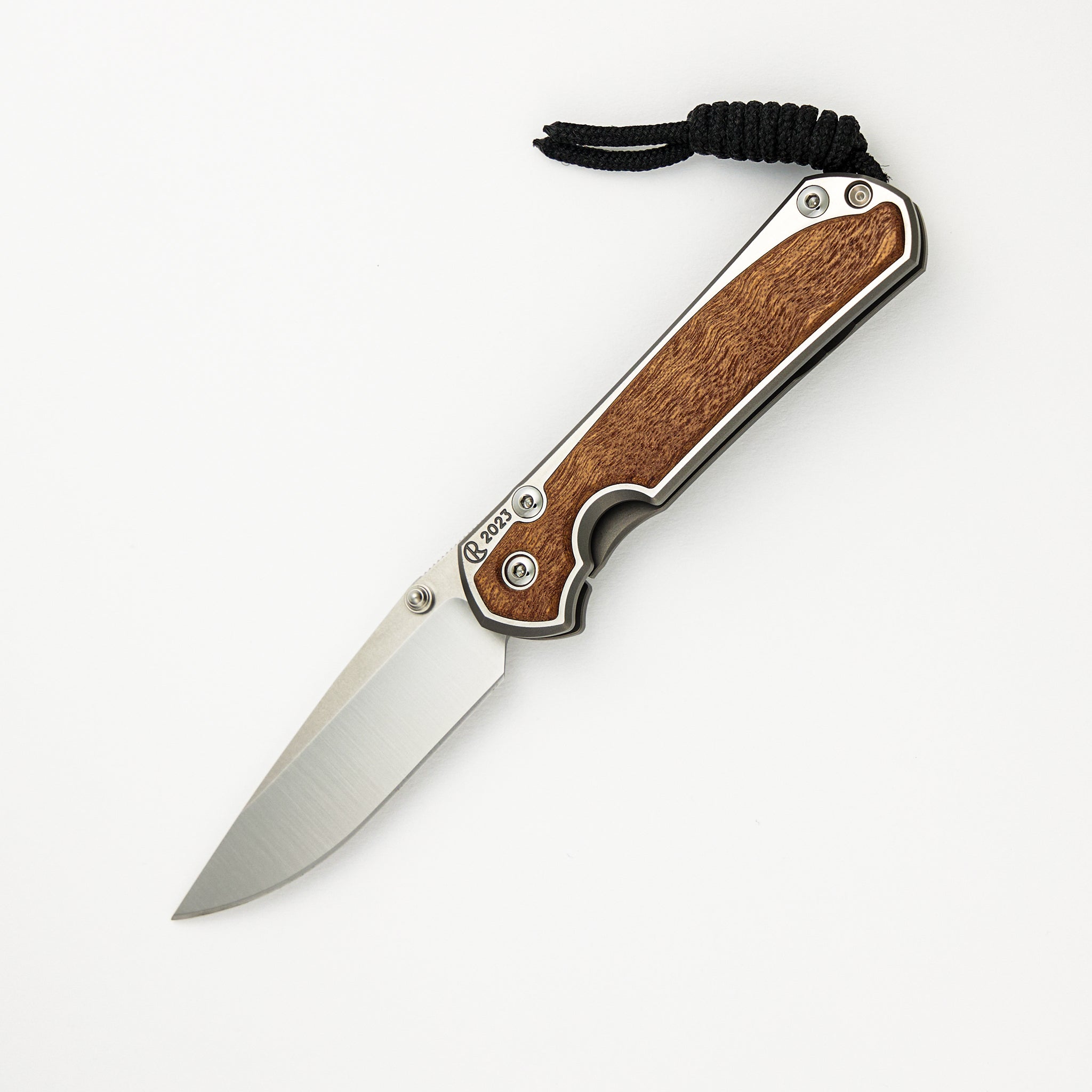 Chris Reeve Small Sebenza 31 - Annual 2023 - Drop Point CPM MagnaCut Blade - Sapele Mahogany Inlays - Silver Single Thumb Lug