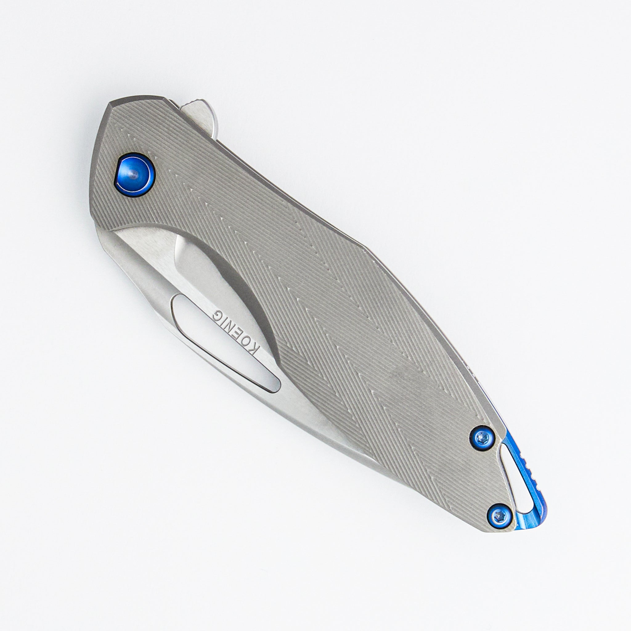 Arius - Patterned Titanium Handle - Blue Hardware - Burnished w/ Polished Flats M390 Blade