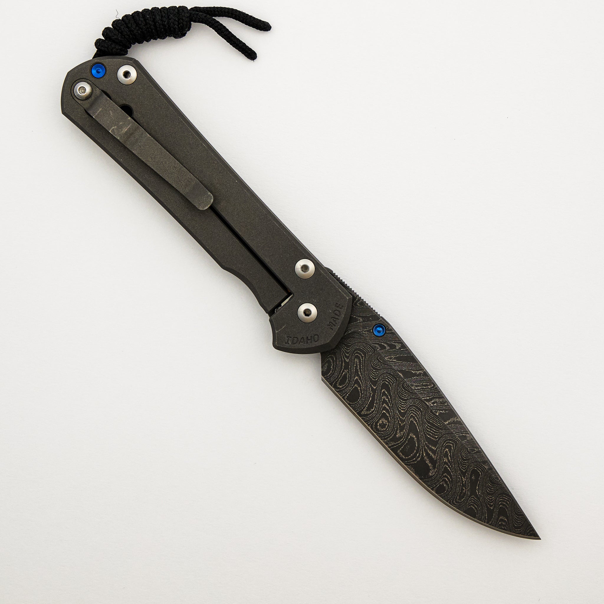 Large Sebenza 31 Unique Graphic - Drop Point Boomerang Blade - Blue Single Thumb Lug