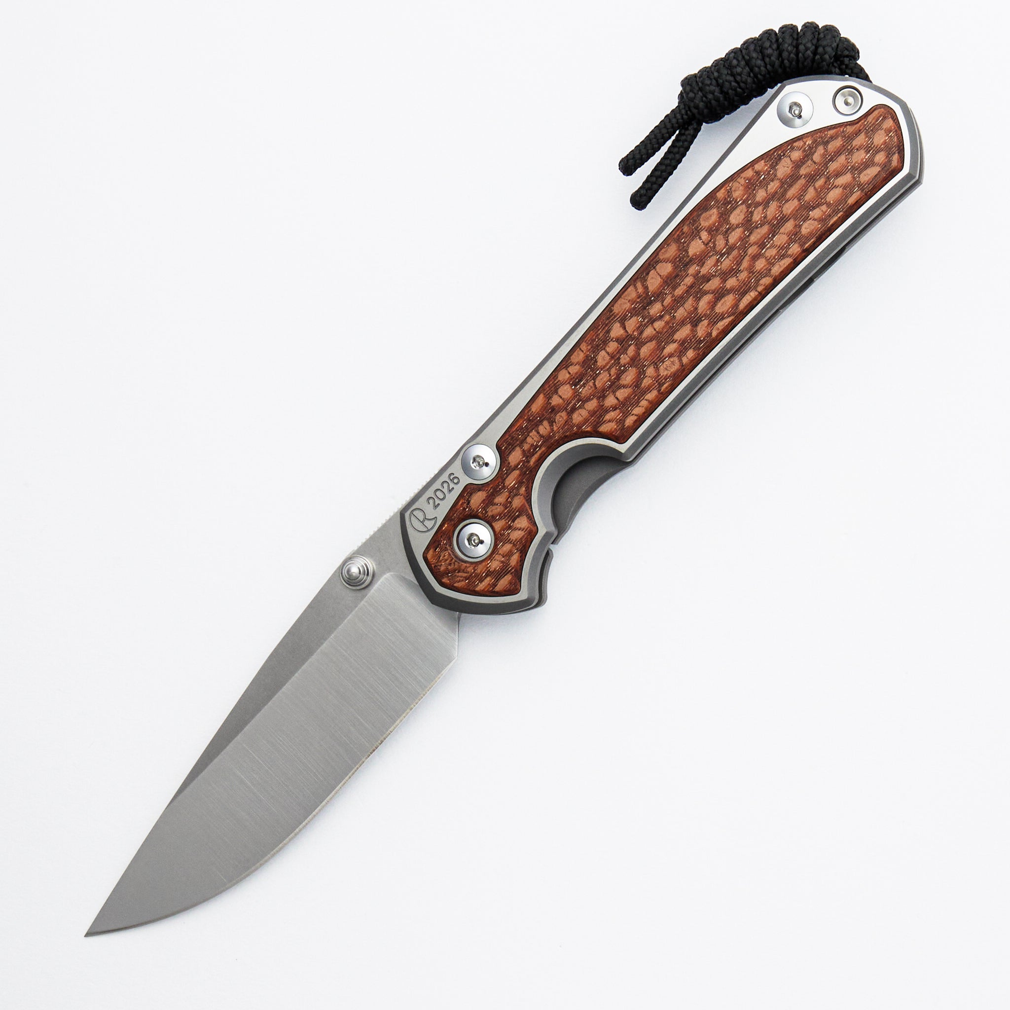 Large Sebenza 31 Annual 2026 - Leopardwood Inlay - Drop Point CPM MagnaCut Blade - Silver Single Thumb Lug