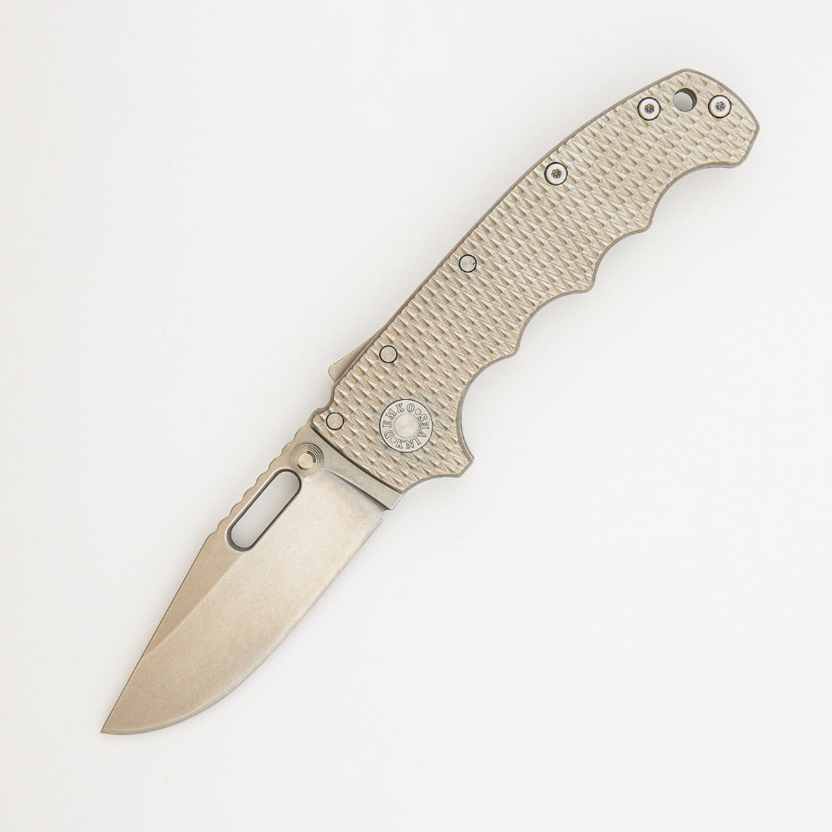 MGAD20 - Clip Point MagnaCut Blade - Textured Titanium Handle