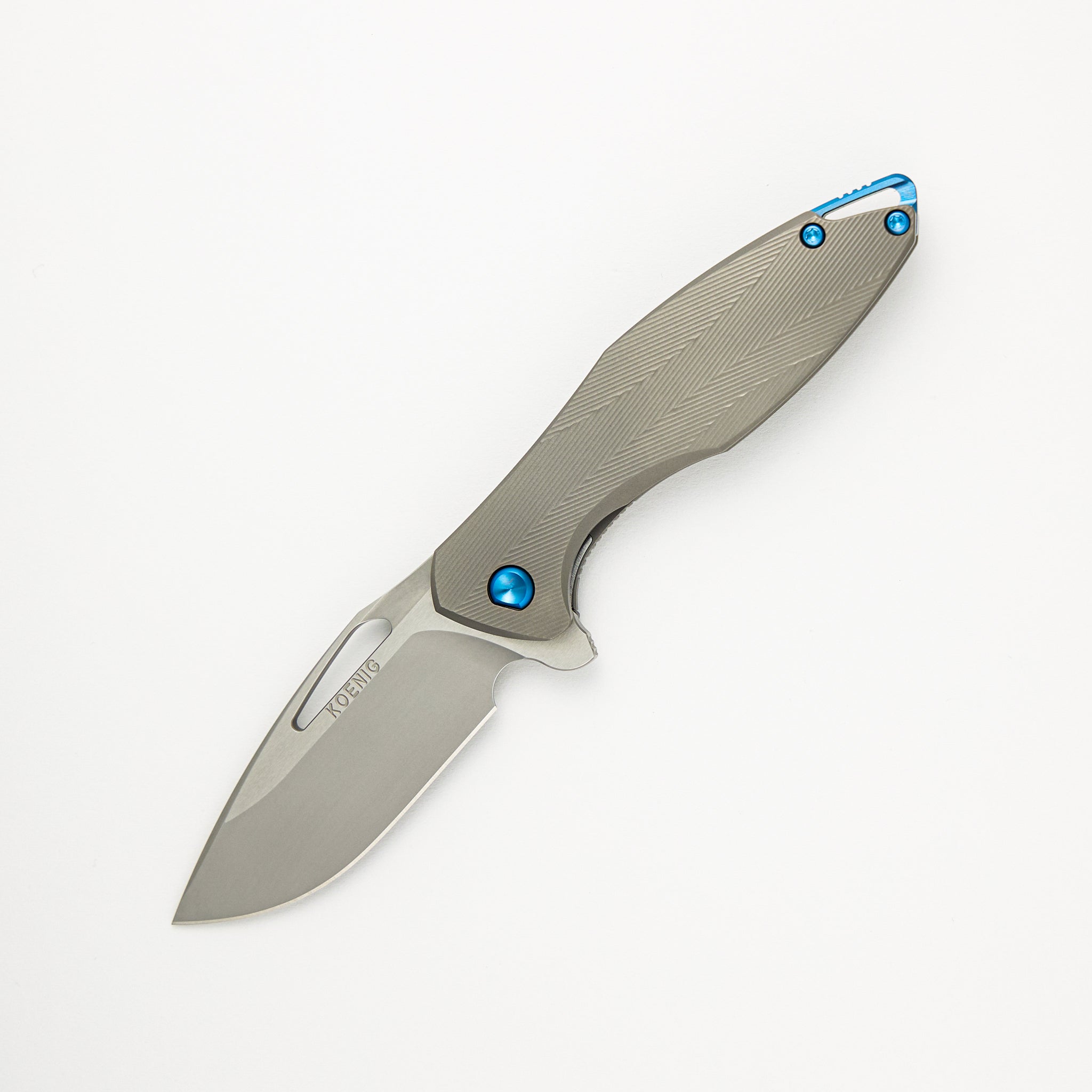 Mini Arius - Patterned Titanium Handle - Blue Hardware -  Burnished W/ Polished Flats M390 Blade