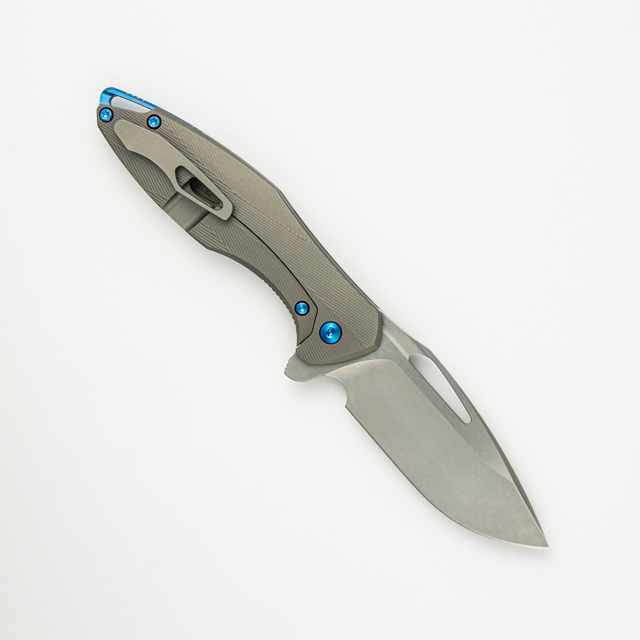 Mini Arius - Patterned Titanium Handle - Blue Hardware -  Burnished W/ Polished Flats M390 Blade