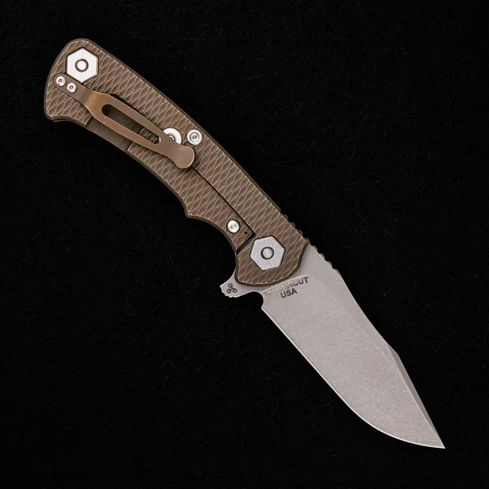 PROJECT X – STONEWASH MAGNACUT CLIP POINT – TRI-WAY – BATTLE BRONZE – BLACK G10