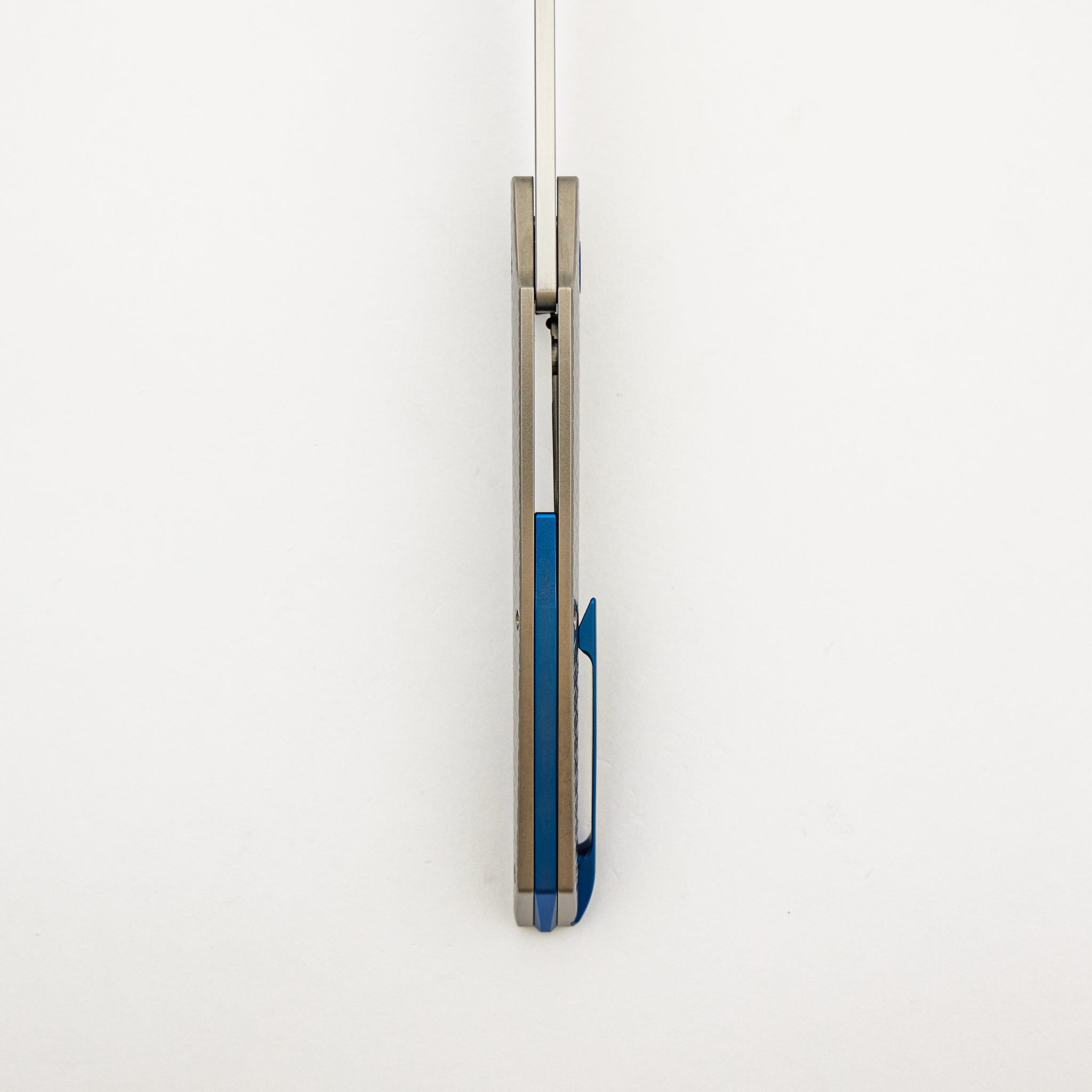 Model T Gen. 2 - Titanium Handle W/ Salmiakki Milling - RWL-34 Blade - Blue Accents