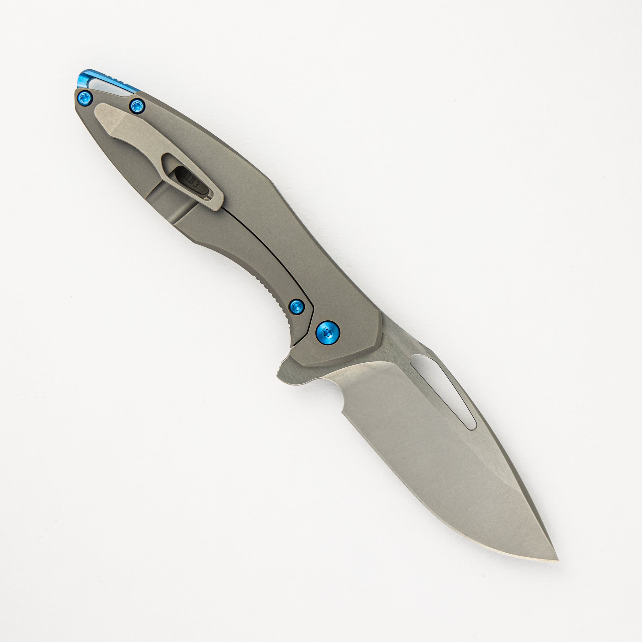 Koenig Mini Arius - Smooth Titanium Handle - Blue Hardware -  Burnished W/ Polished Flats M390 Blade