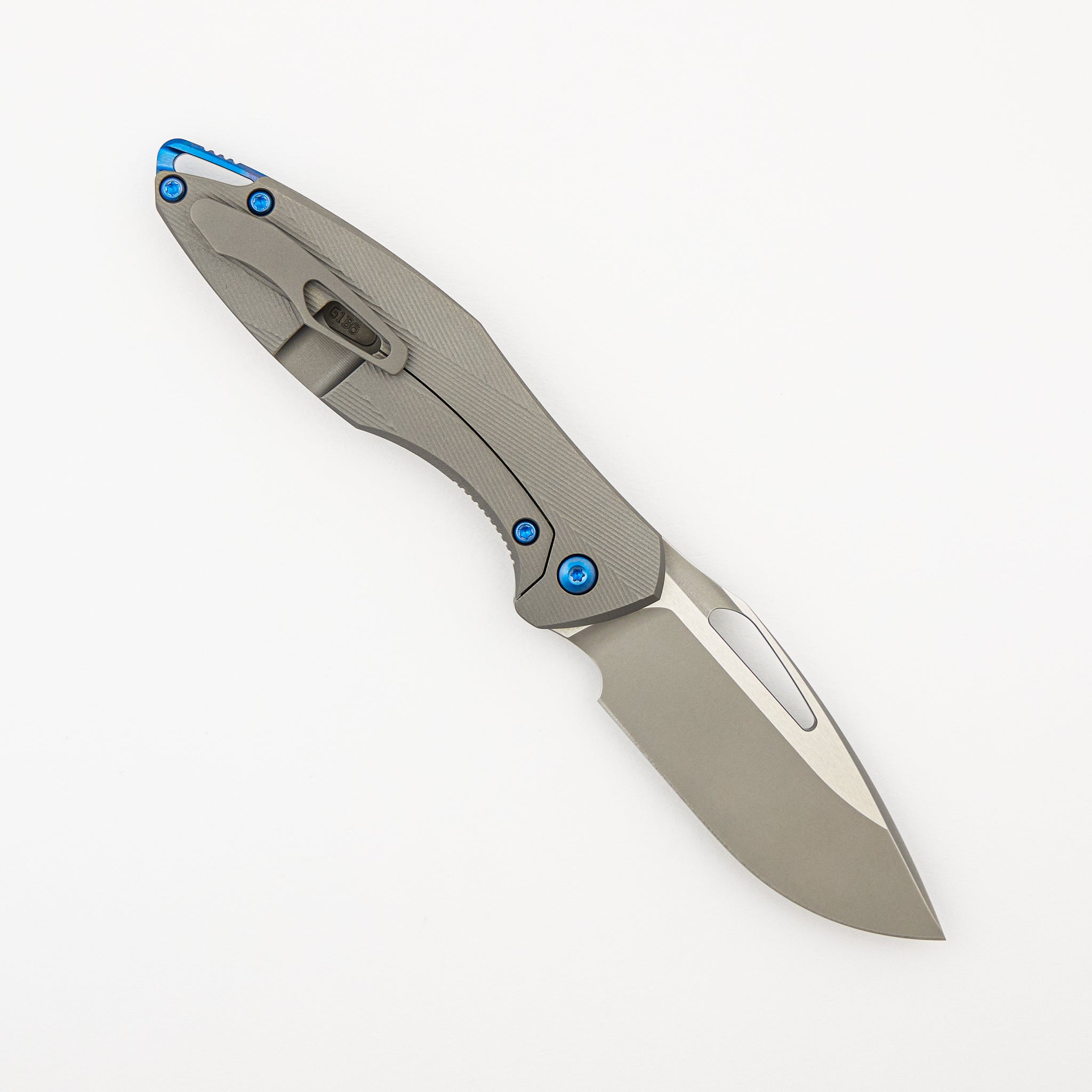 Mini Arius - Non Flipper - Patterned Titanium Handle - Blue Hardware - Burnished W/ Polished Flats M390 Blade