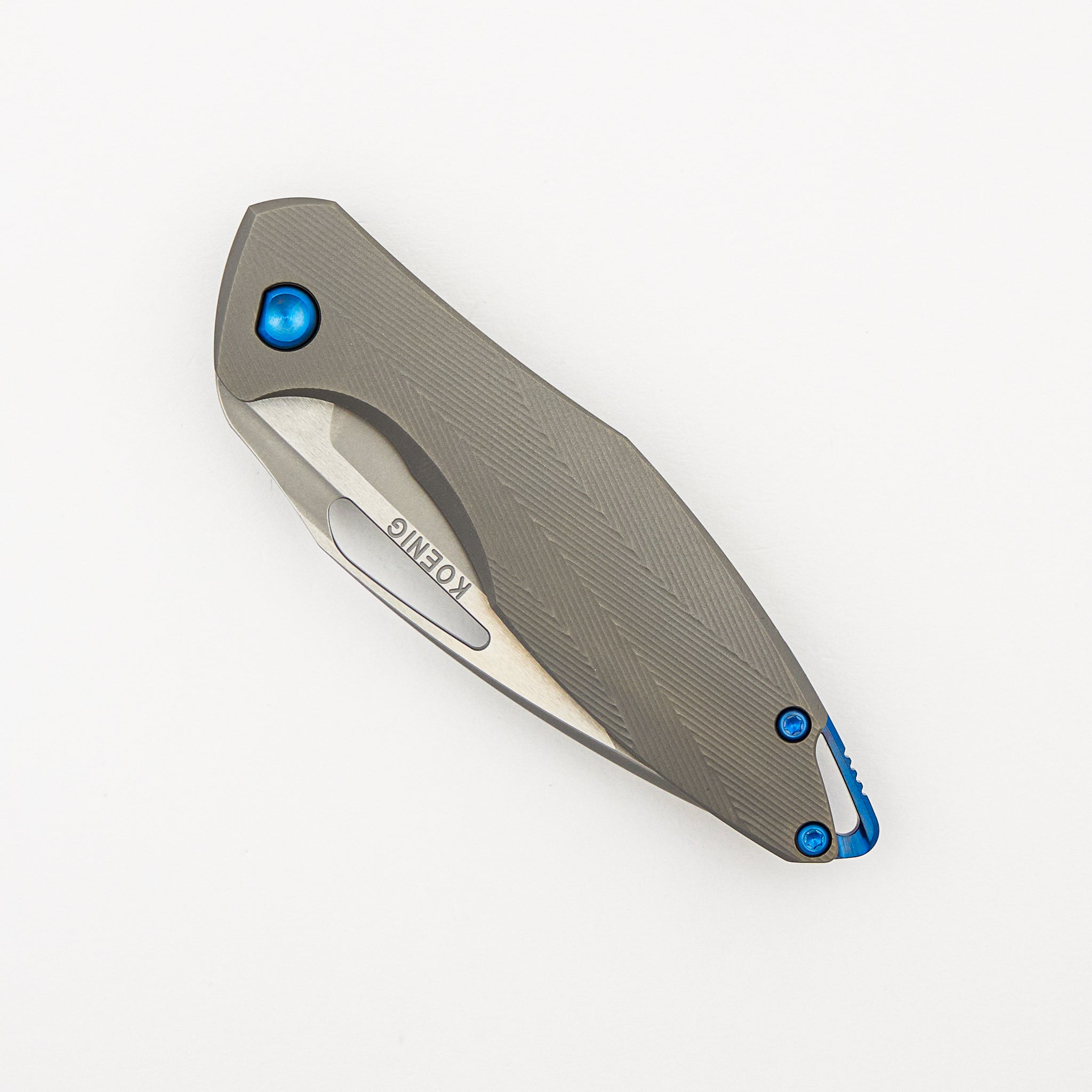 Mini Arius - Non Flipper - Patterned Titanium Handle - Blue Hardware - Burnished W/ Polished Flats M390 Blade