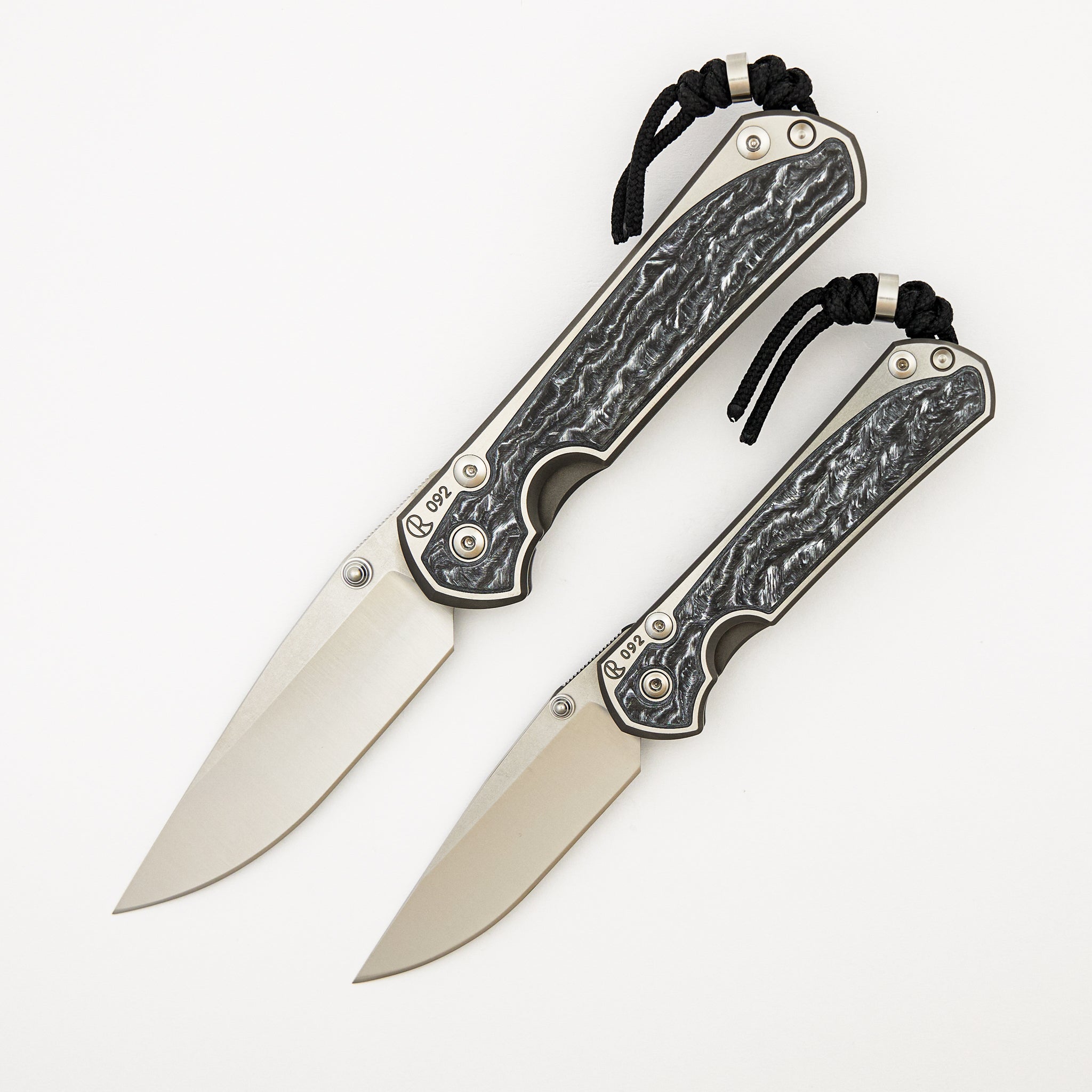 Large & Small Sebenza 31 Numbered Matched Set - White CarboTi Inlay - Polished Drop Point CPM MagnaCut Blade - Silver Double Lugs