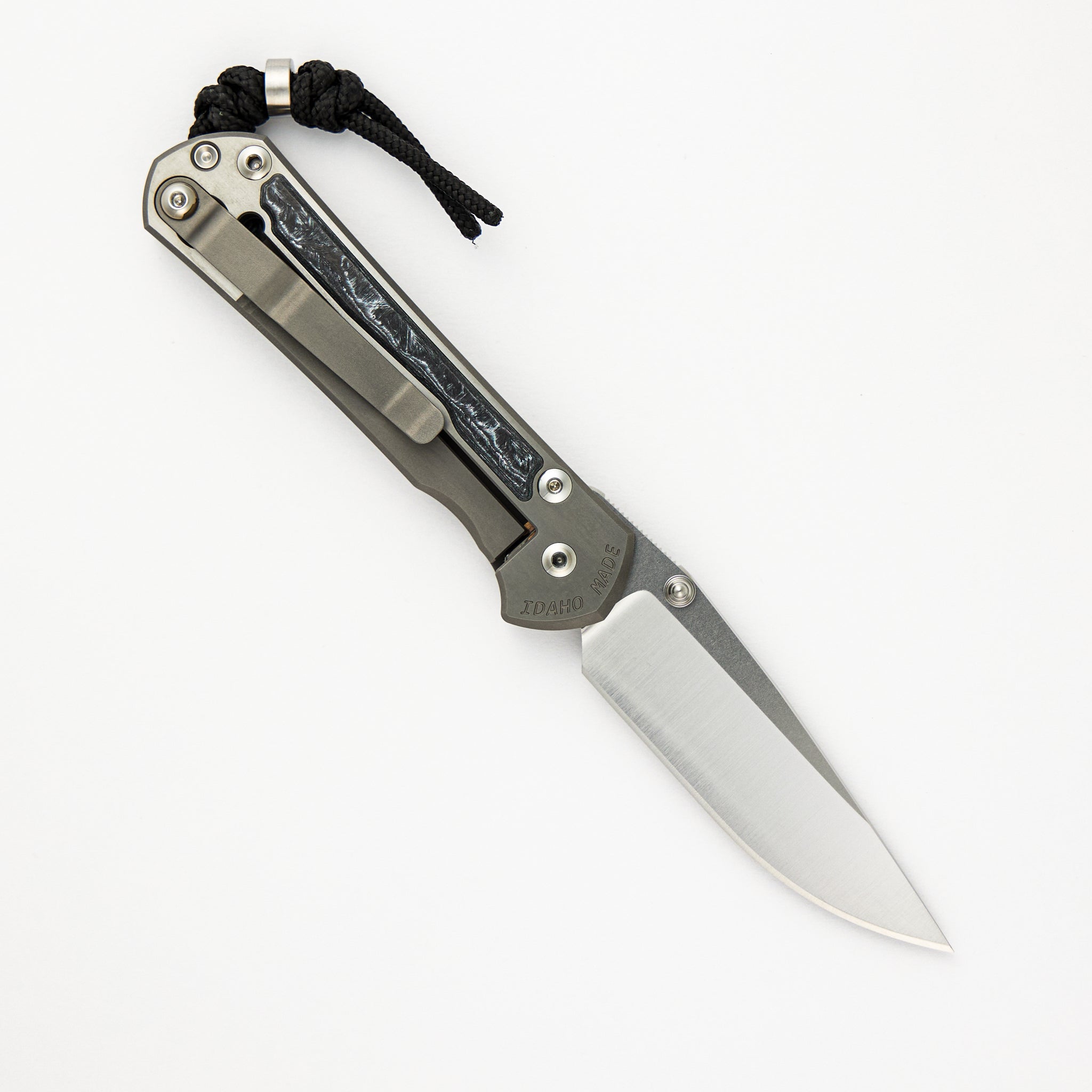 Chris Reeve Small Sebenza 31 - White CarboTi Inlay - Polished Drop Point CPM MagnaCut Blade - Silver Double Lugs - Completed