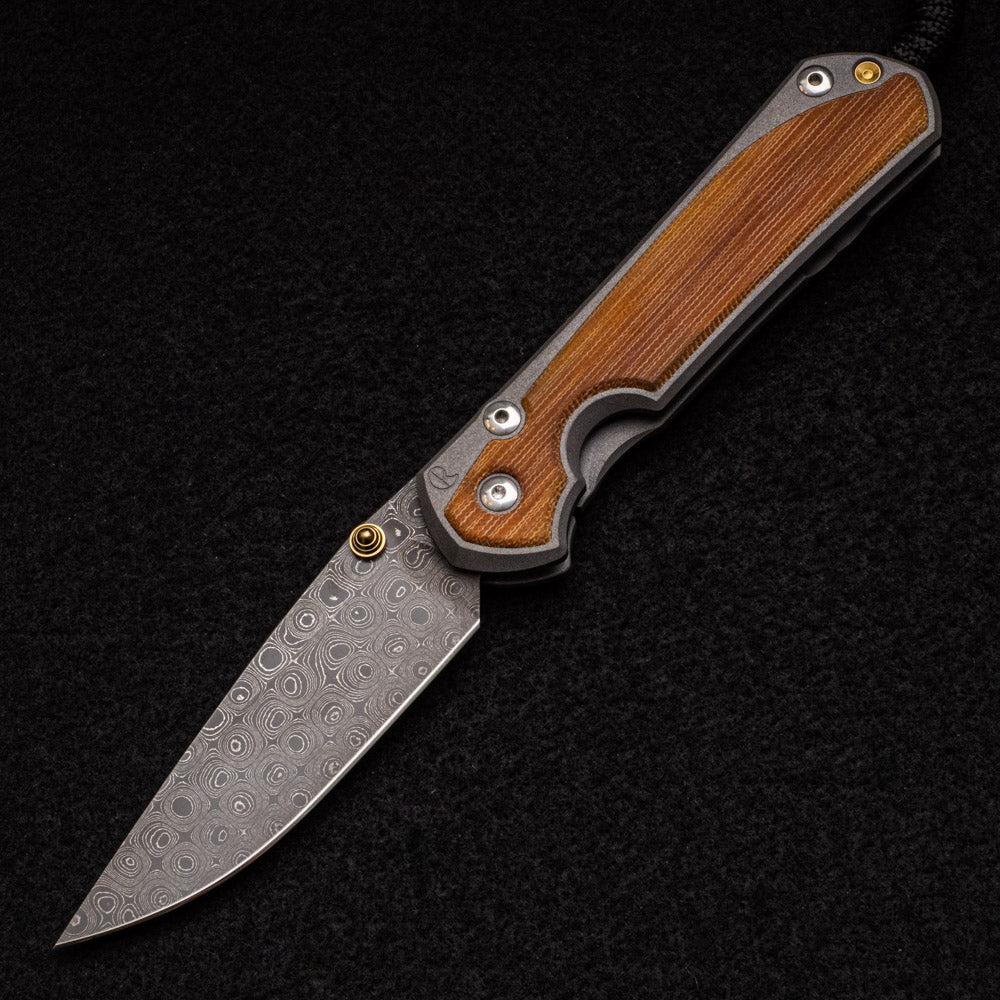 CHRIS REEVE LARGE SEBENZA 31 NATURAL CANVAS MICARTA INLAY - RAINDROP BLADE - GOLD DOUBLE THUMB LUGS