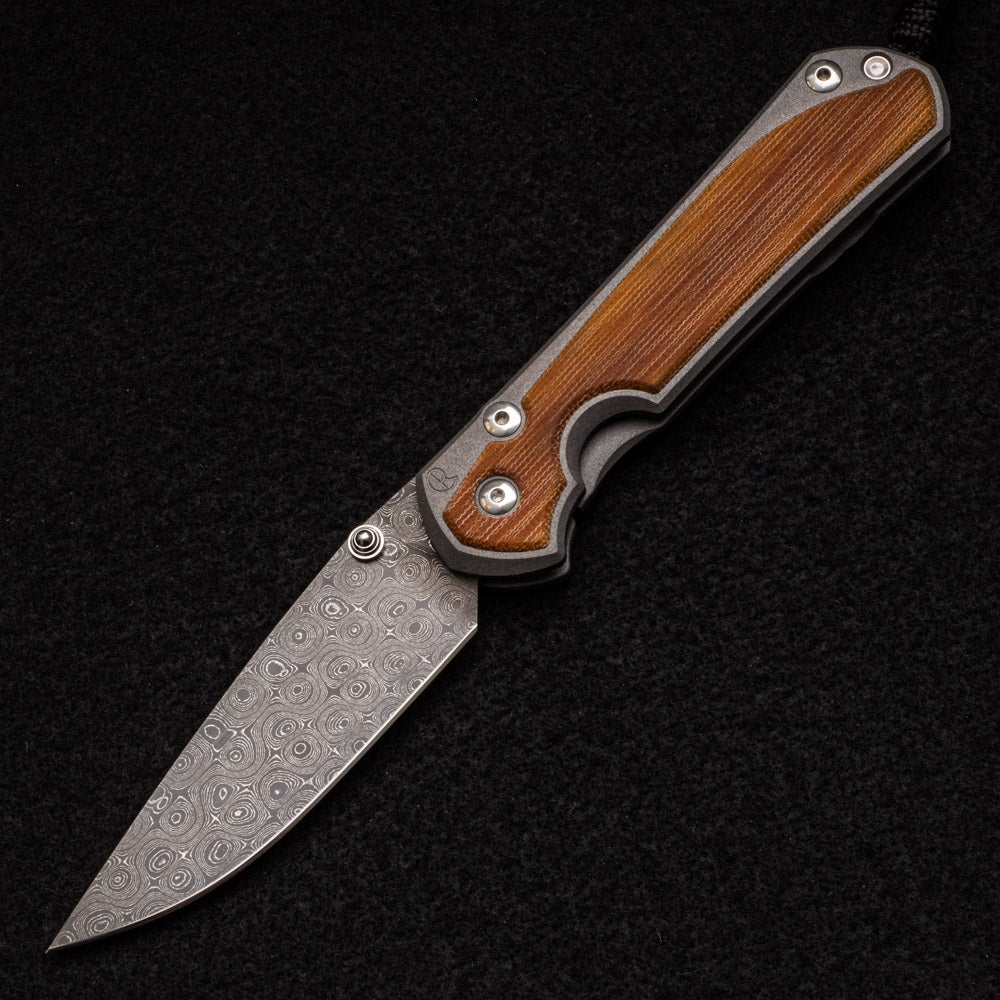 CHRIS REEVE LARGE SEBENZA 31 NATURAL CANVAS MICARTA INLAY - RAINDROP BLADE - SILVER DOUBLE THUMB LUGS