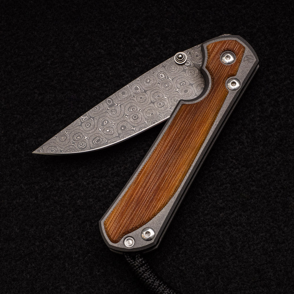 CHRIS REEVE LARGE SEBENZA 31 NATURAL CANVAS MICARTA INLAY - RAINDROP BLADE - SILVER DOUBLE THUMB LUGS