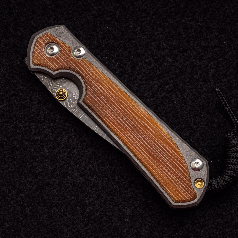 CHRIS REEVE LARGE SEBENZA 31 NATURAL CANVAS MICARTA INLAY - LADDER BLADE - GOLD DOUBLE THUMB LUGS