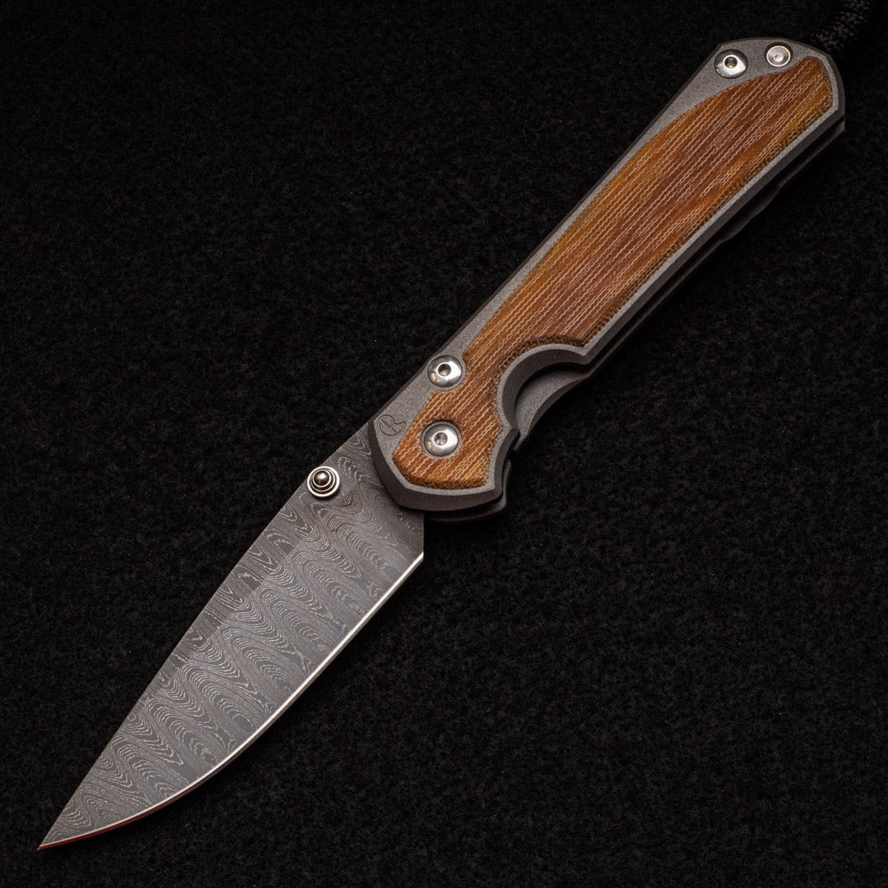 CHRIS REEVE LARGE SEBENZA 31 NATURAL CANVAS MICARTA INLAY - LADDER BLADE - SILVER DOUBLE THUMB LUGS