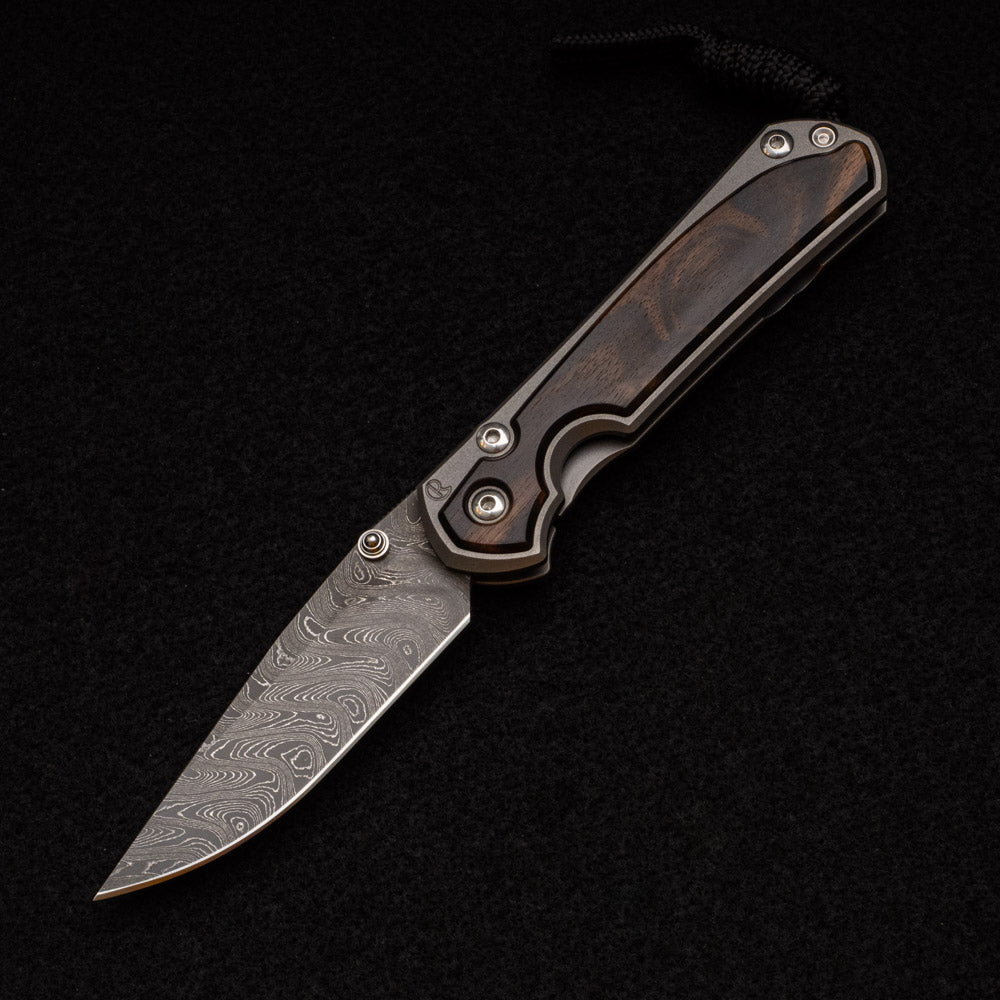 CHRIS REEVE SMALL SEBENZA 31 MACASSAR INLAY - BOOMERANG BLADE - SILVER DOUBLE THUMB LUGS