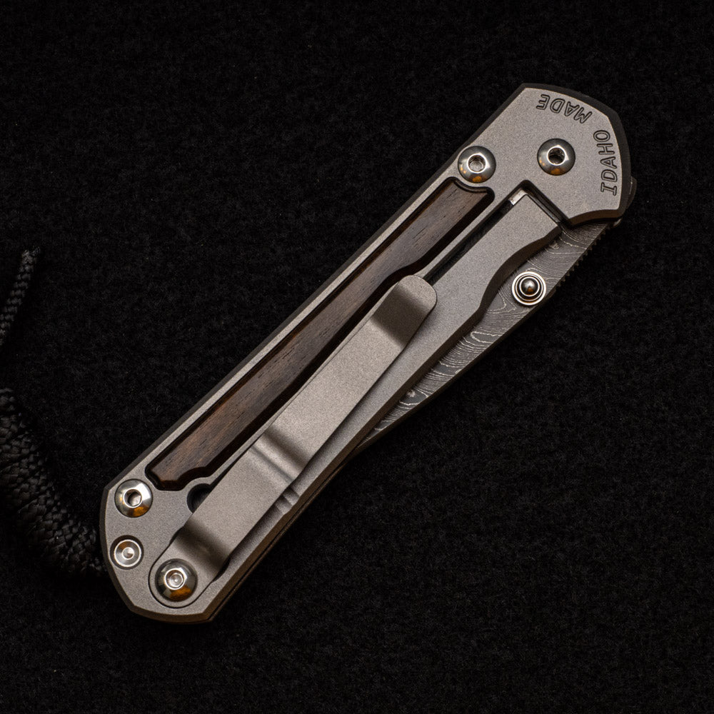 CHRIS REEVE SMALL SEBENZA 31 MACASSAR INLAY - BOOMERANG BLADE - SILVER DOUBLE THUMB LUGS